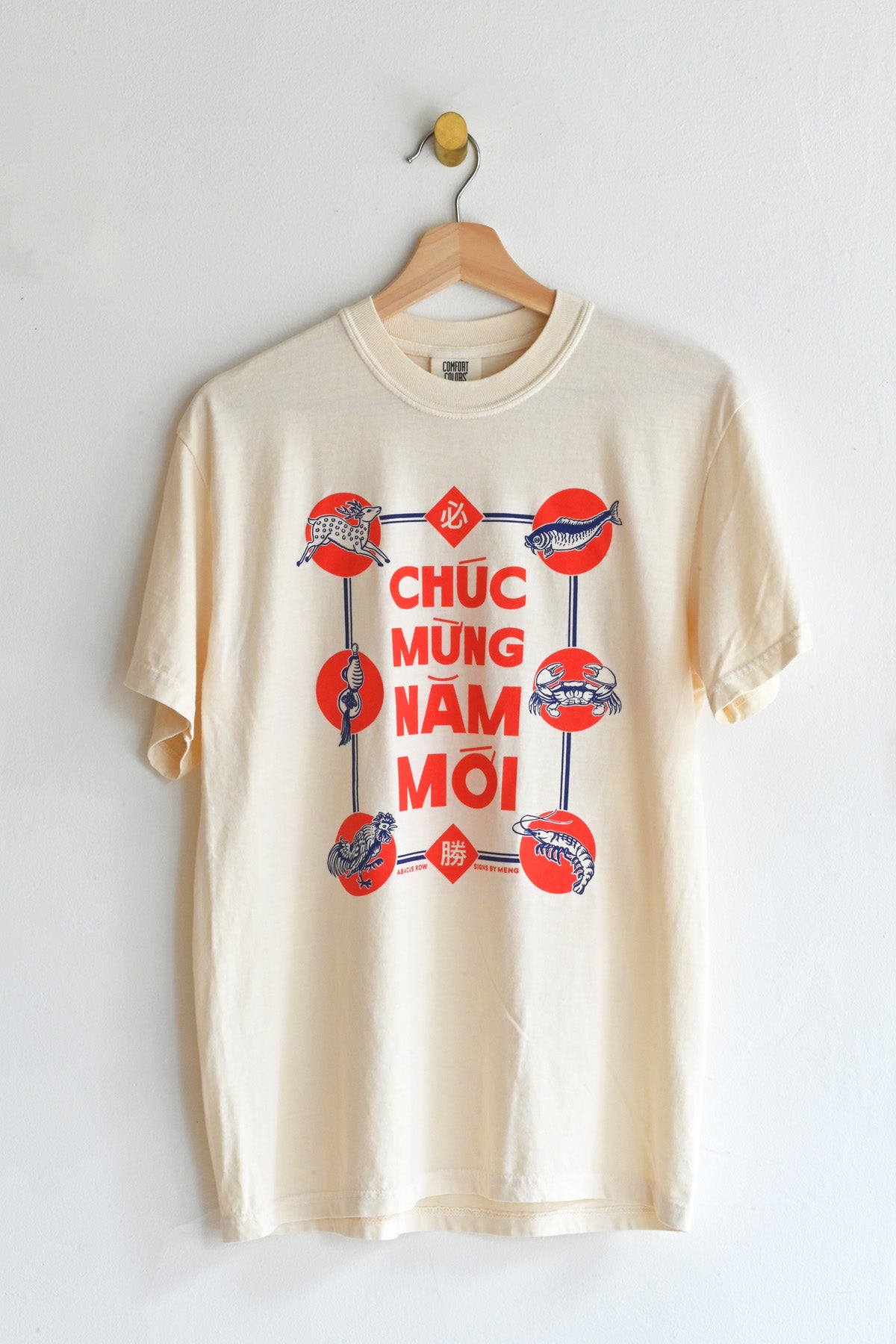Bầu Cua Cá Cọp Tee Shirt at Abacus Row Jewelry