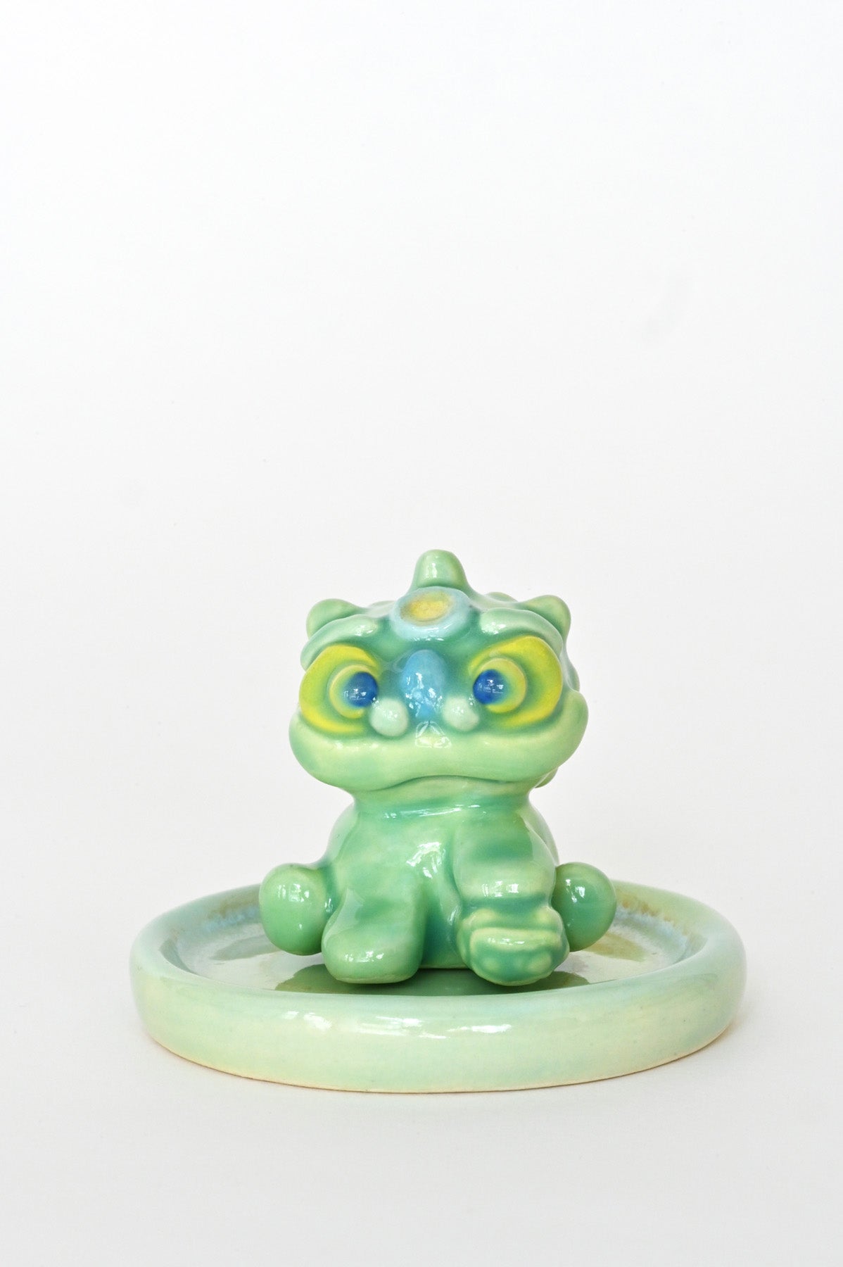 Female Lucky Lion incense holder by Caf Caf Ceramique at Abacus Row
