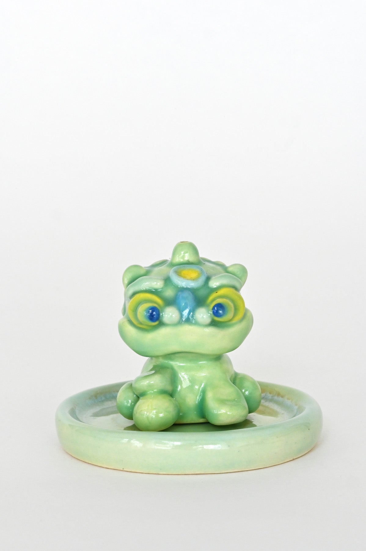 Male Lucky Lion incense holder by Caf Caf Ceramique at Abacus Row