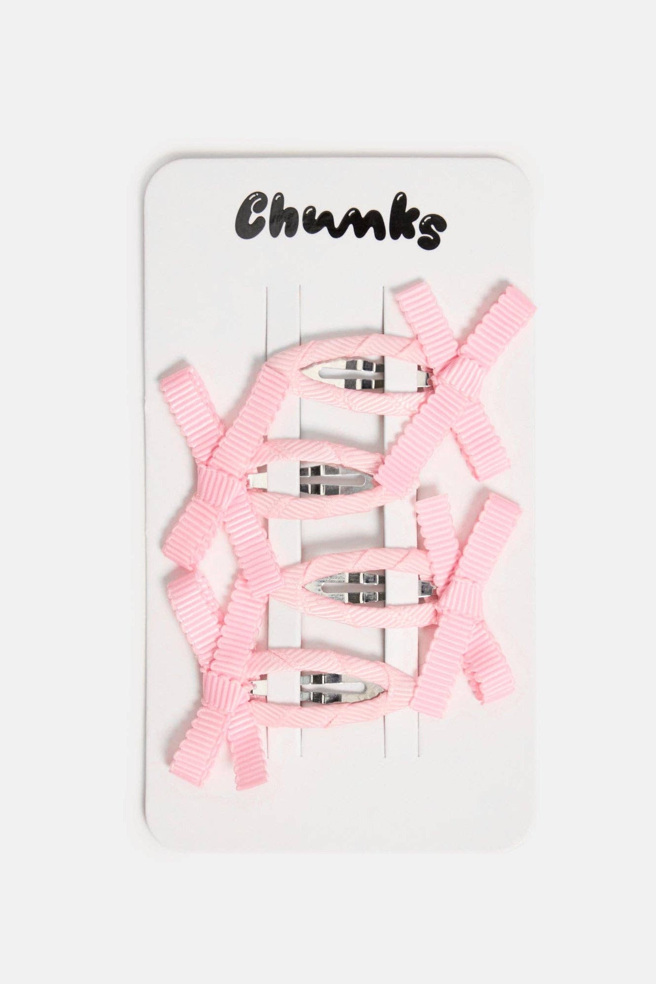 Packaged Blush Bow Snap Clips by Chunks at Abacus Row Jewelry