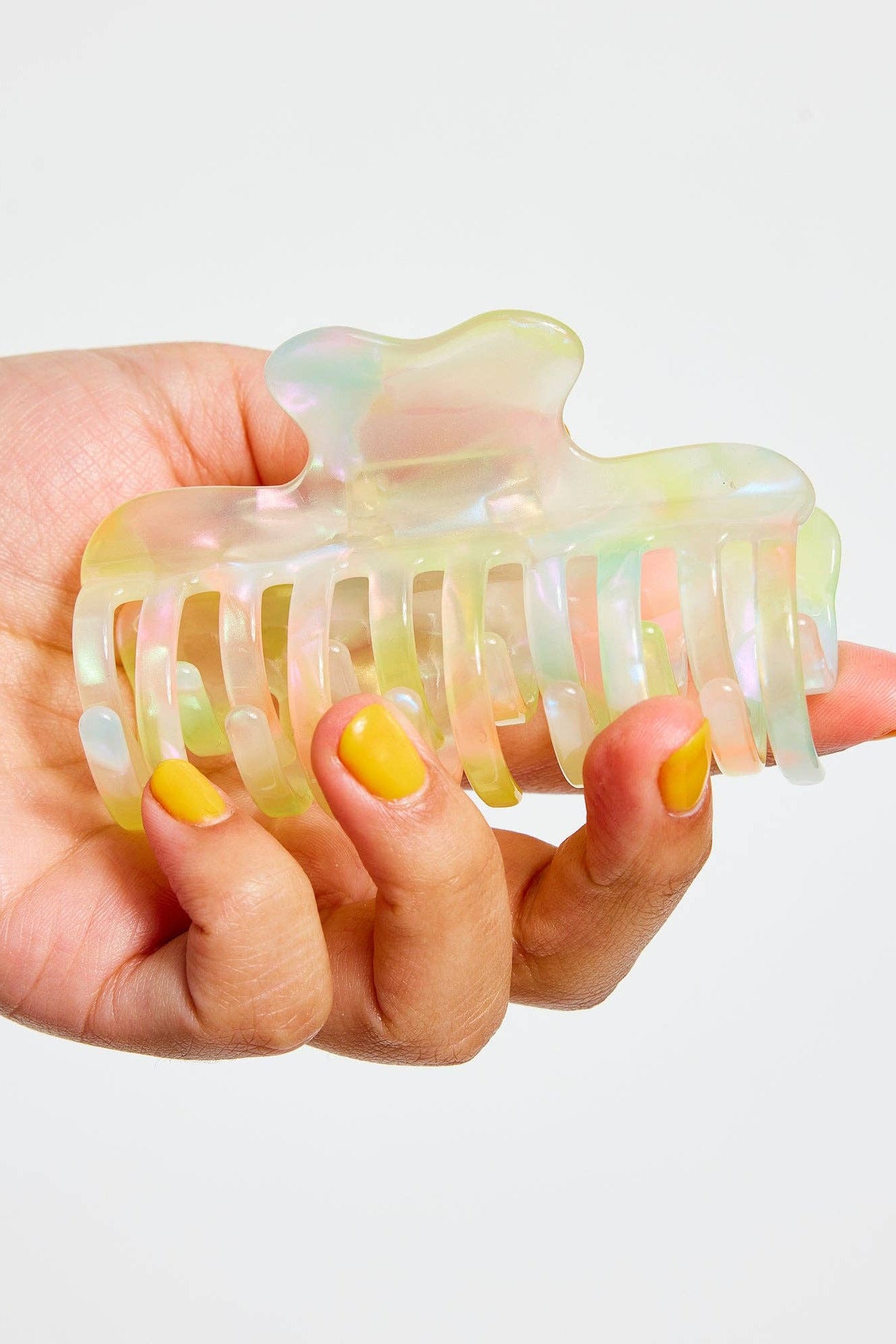 Small Sherbet Jelly Jojo Claw in hand by Chunks at Abacus Row Handmade Jewelry