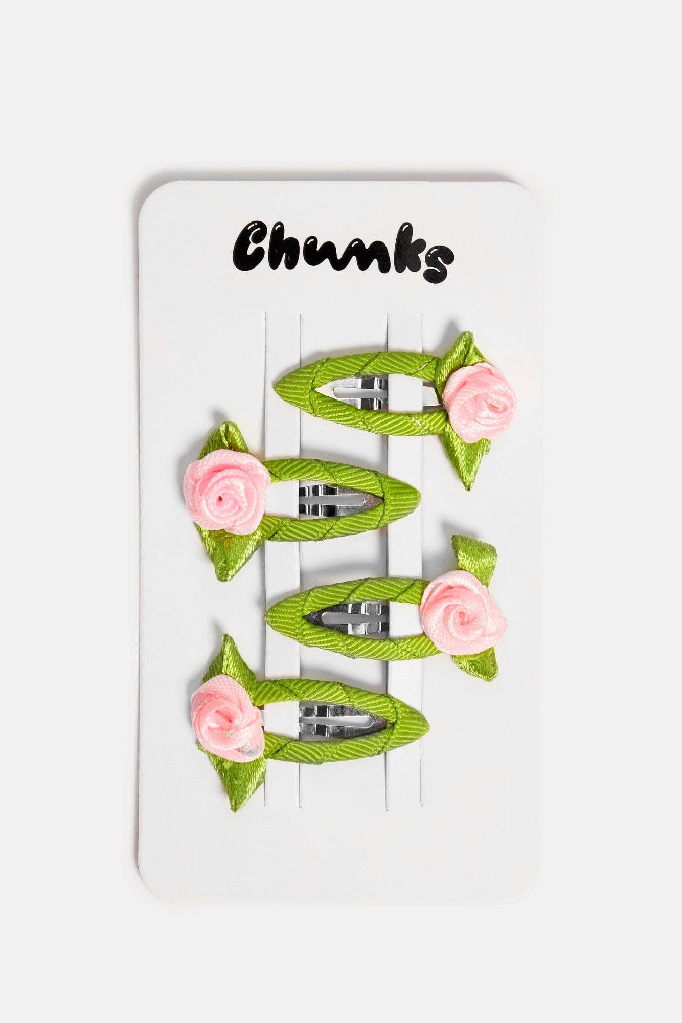 Packaged Blush Rosette Snap Clips by Chunks at Abacus Row Jewelry