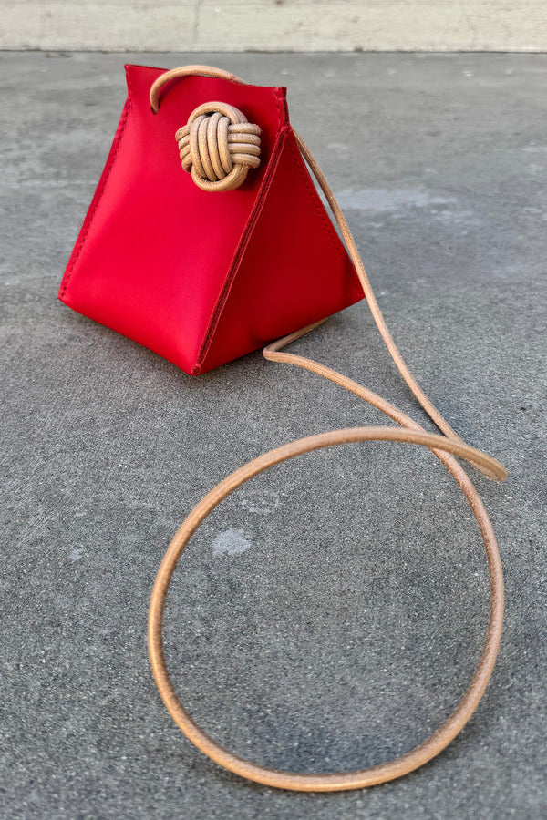 Classic Red Leather Knot Good Luck Charm by Clau at Abacus Row Handmade Jewelry