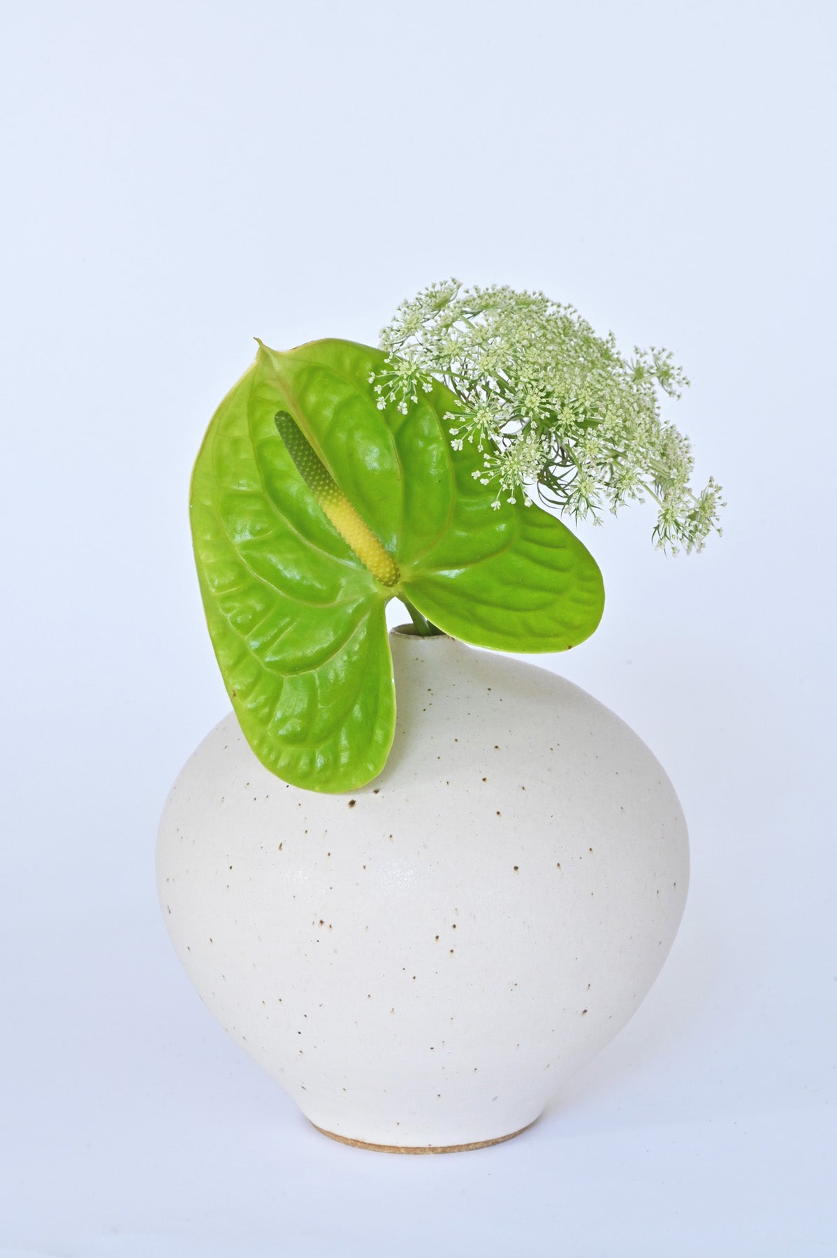 Green Vessel No. 8 in warm white with flowers by Dana Chieco at Abacus Row Handmade Jewelry