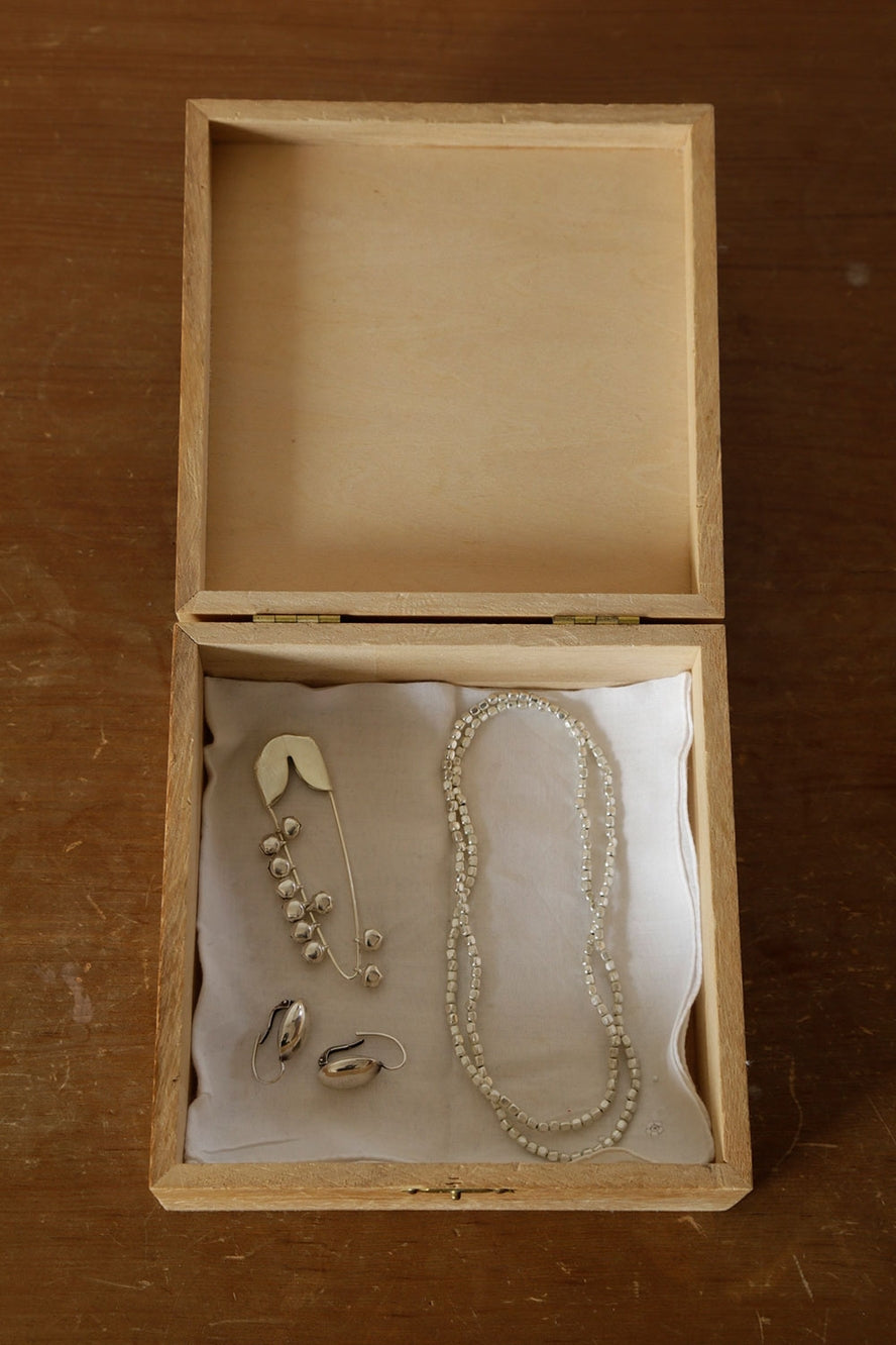 Boxed Small Silver Safety Pin with Bells by Fog Linen at Abacus Row