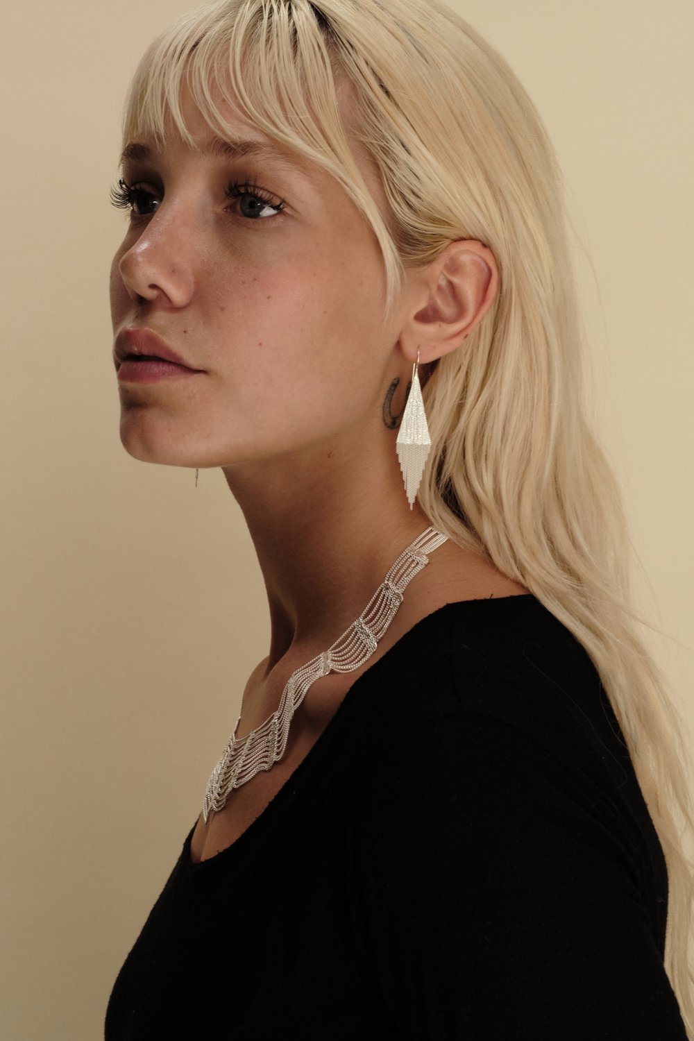Modeled Silver on Silver Flint Earrings by Hannah Keefe at Abacus Row Handmade Jewelry