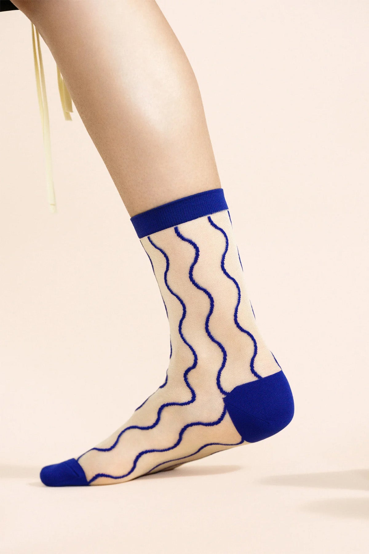 Hansel from Basel Cobalt City Pop Sheer Crew Sock modeled at Abacus Row Handmade Jewelry