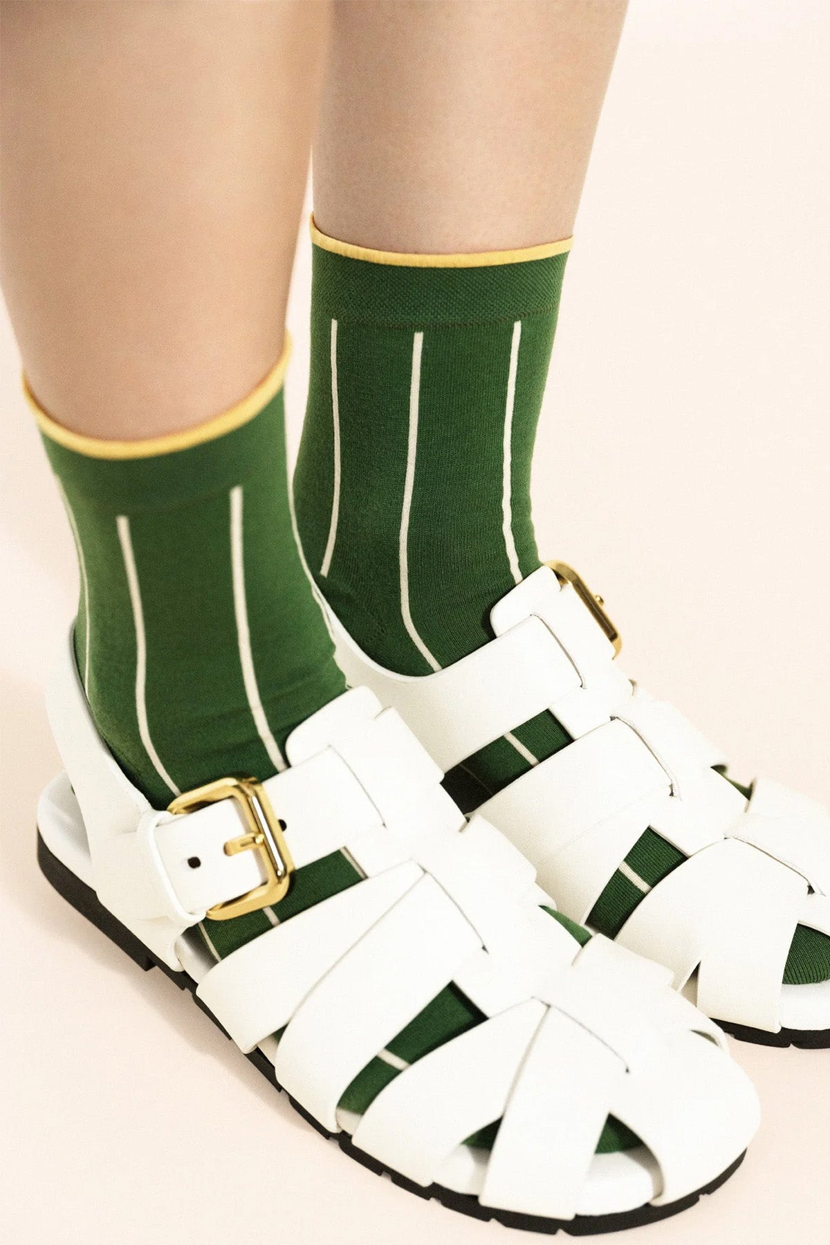 Hansel from Basel Green Courtside Short Crew Socks close up modeled at Abacus Row Handmade Jewelry