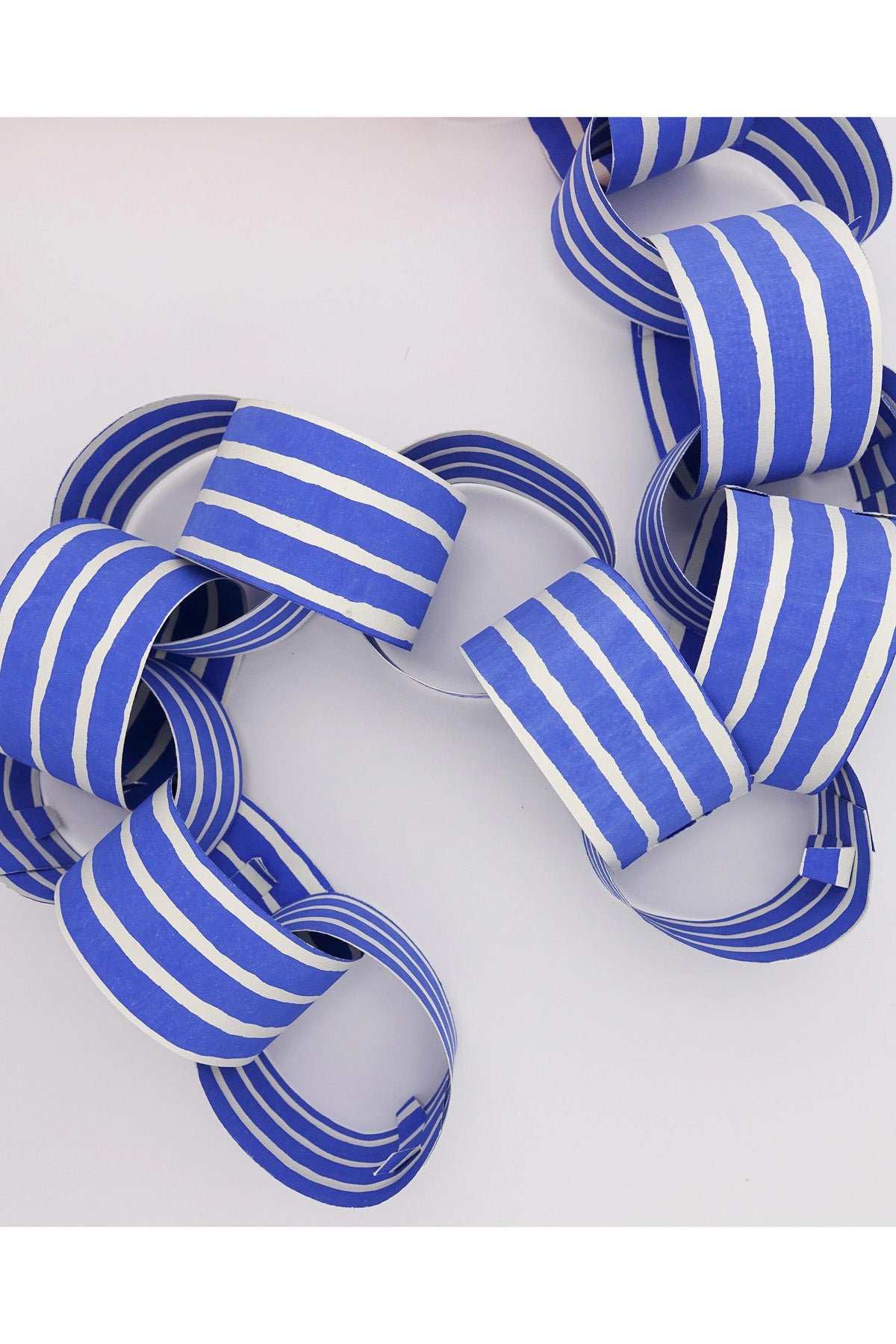 Blue Paper Chain Garland by Hataguchi Collective detail at Abacus Row