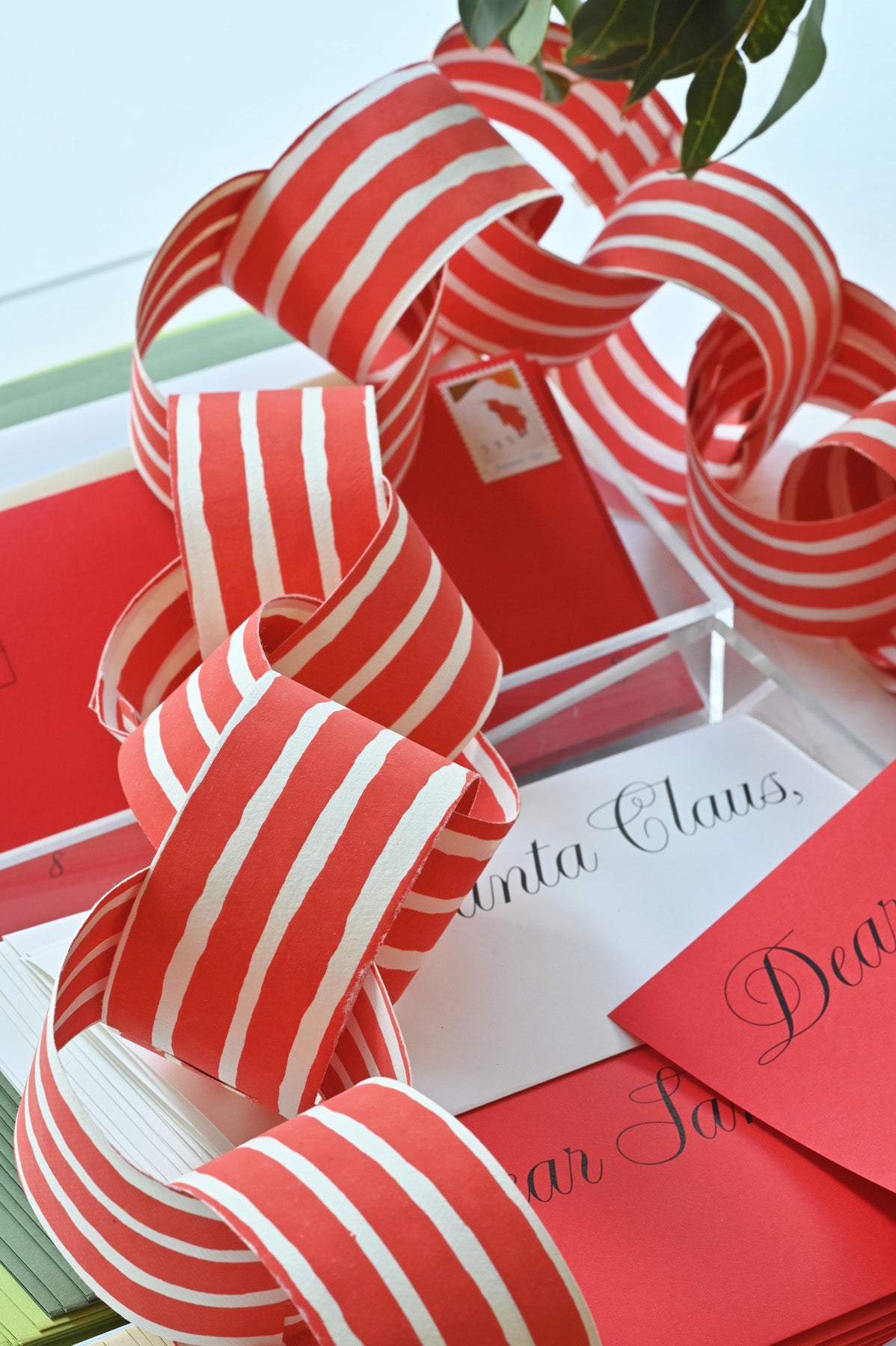 Red Paper Chain Garland by Hataguchi Collective styled at Abacus Row