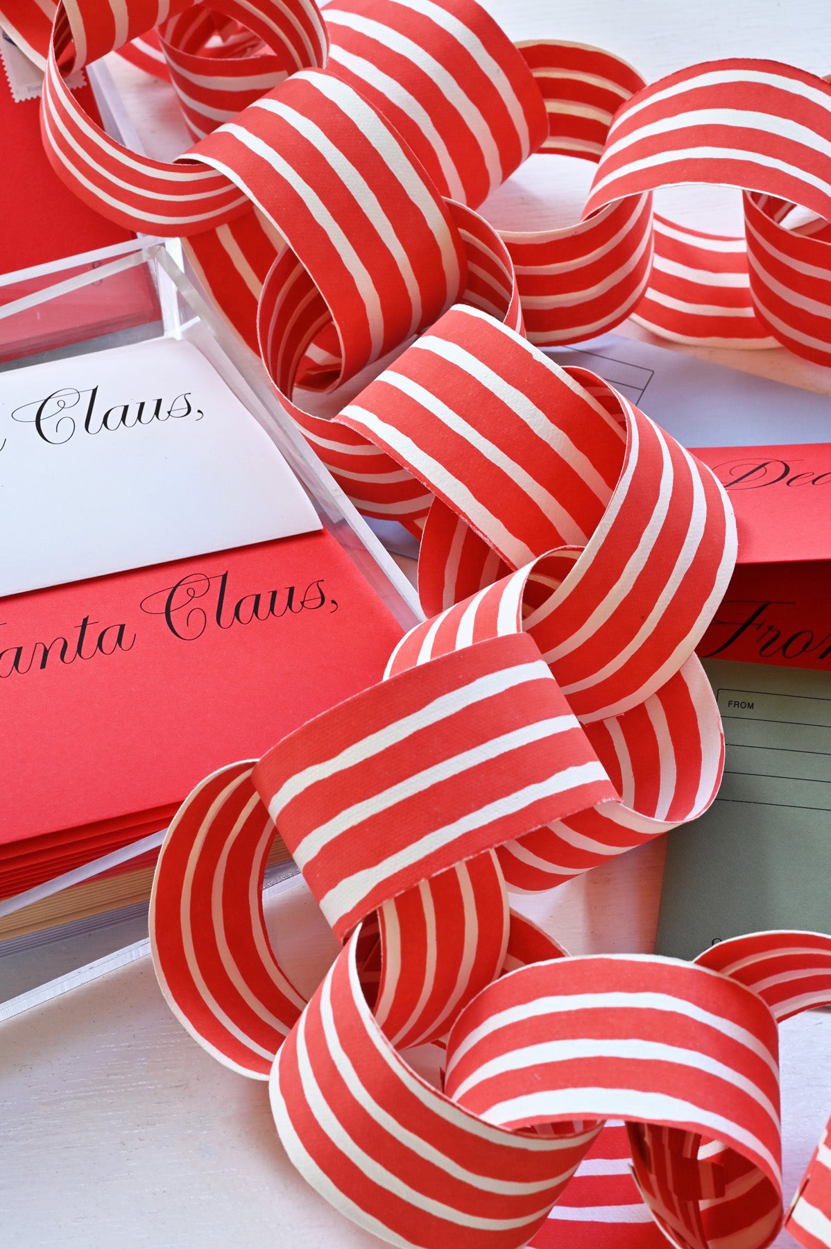 Red Paper Chain Garland by Hataguchi Collective styled at Abacus Row