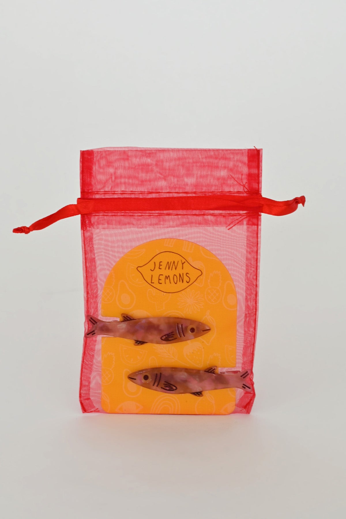Sardine Alligator Hair Clips in packaging by Jenny Lemons at Abacus Row Jewelry