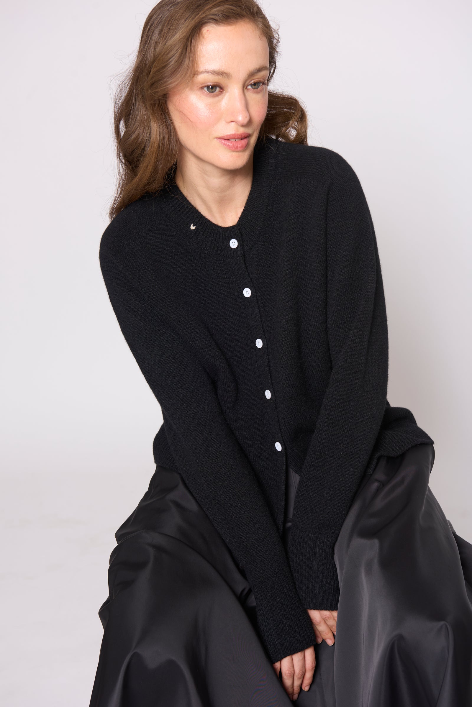 Black Button Cardigan by Lao Lao at Abacus Row