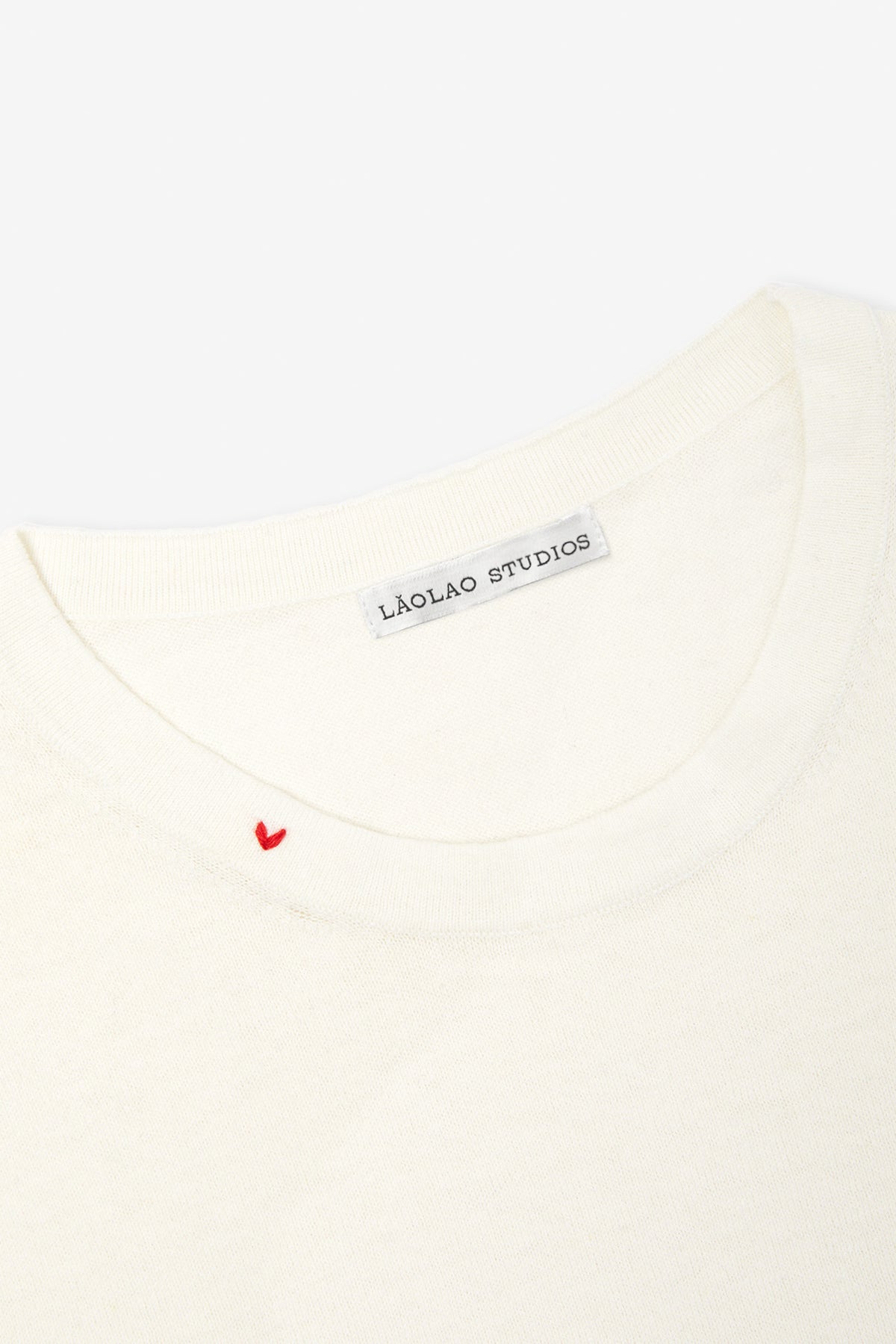 Neck Detail of the Ivory White Silk Tee by Lao Lao at Abacus Row Handmade Jewelry