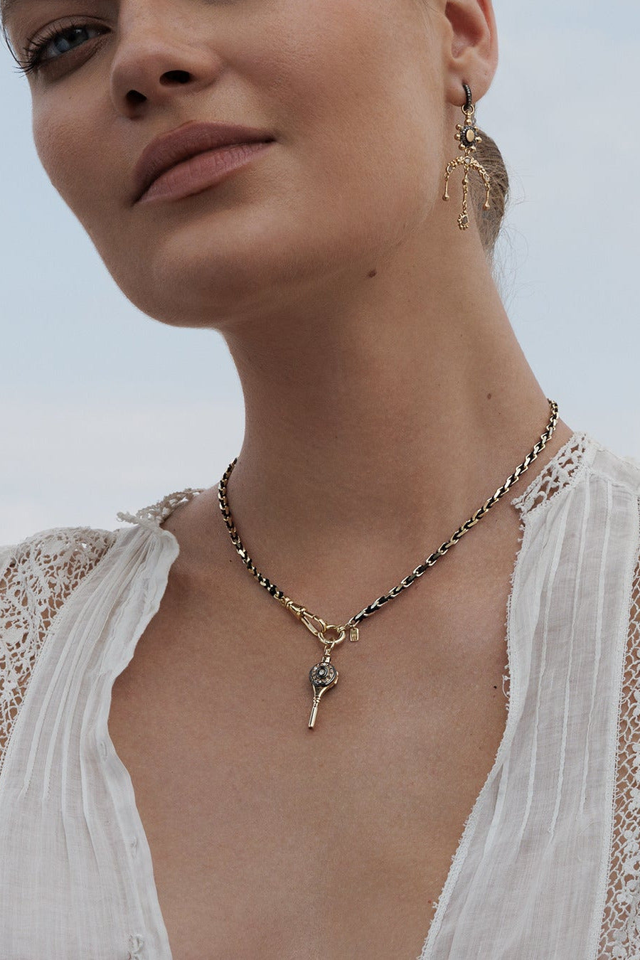 No.969 Gold Black Necklace Open Key Charm On Model by Marie Laure Chamorel at Abacus Row Handmade Jewelry