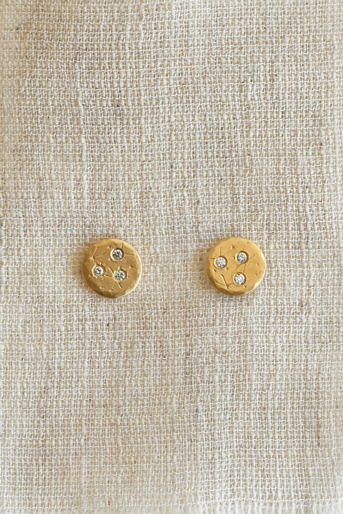 Medium Treasure Coin Diamond Stud Earrings up close by Sarah Swell at Abacus Row Handmade Jewelry