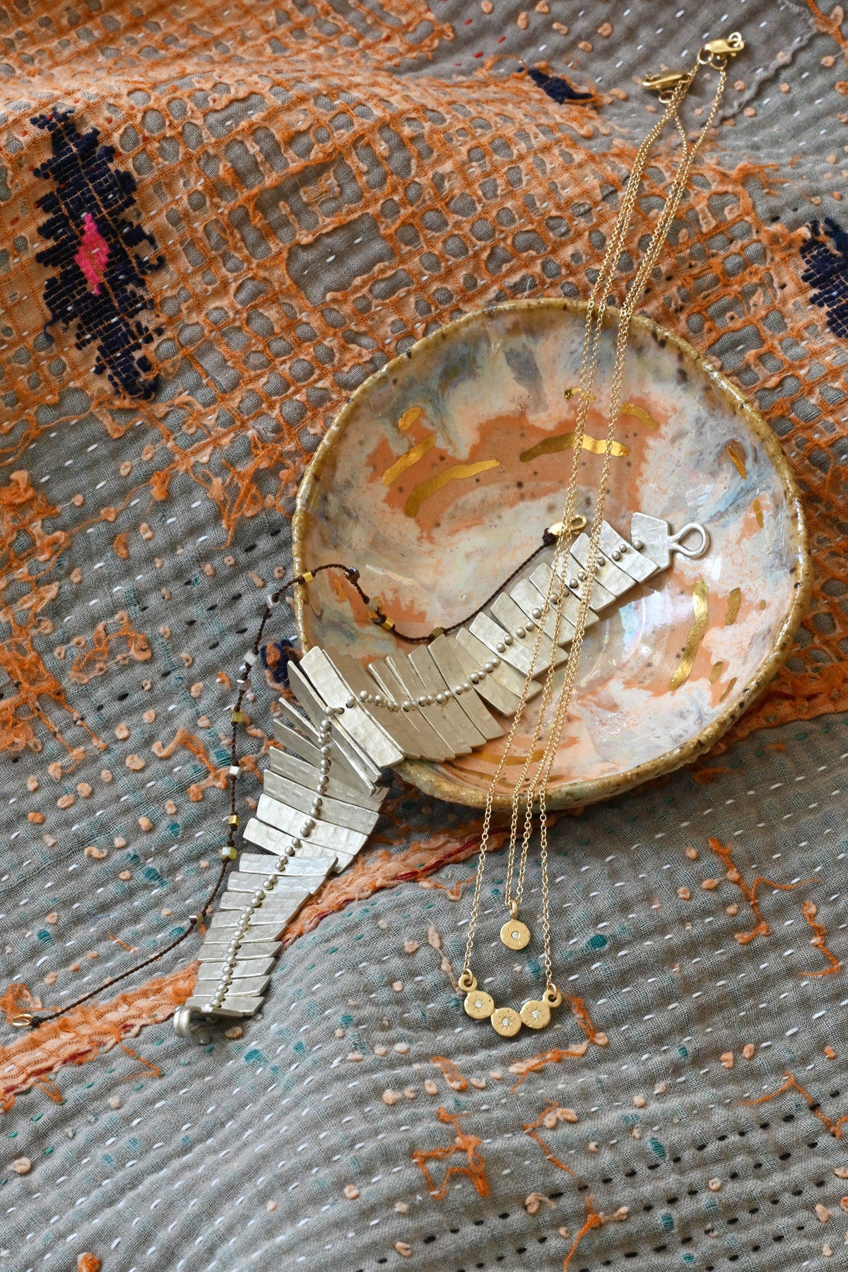 Fishbone Bracelet and coin necklaces by Sarah Swell at Abacus Row Jewelry