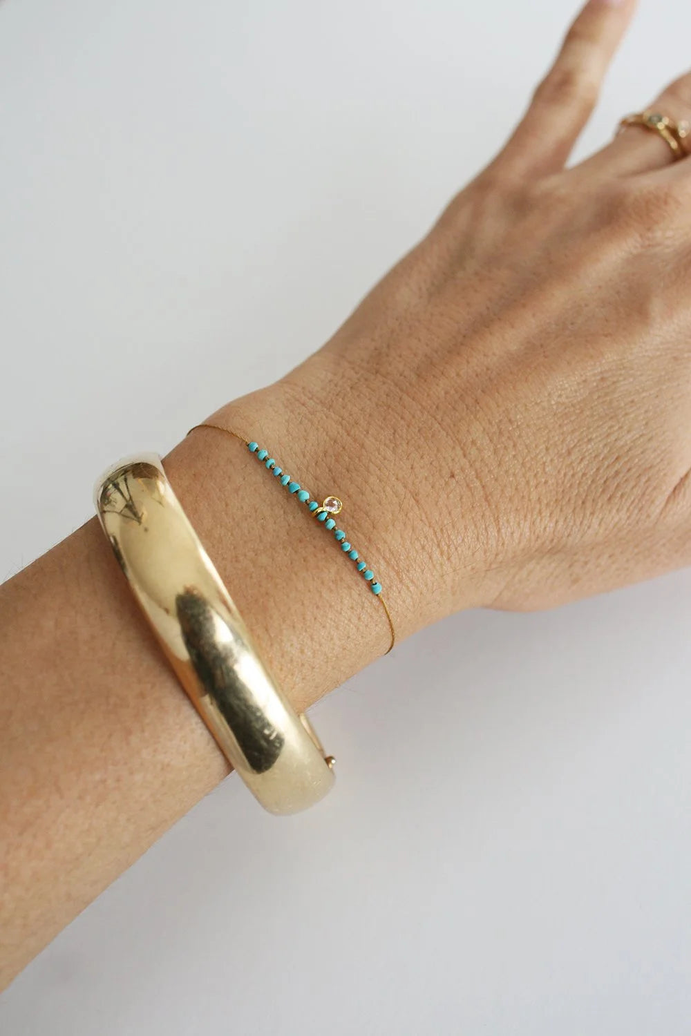 Modeled Sapphire Aegean Bracelet with turquoise by See Real Flowers at Abacus Row Jewelry