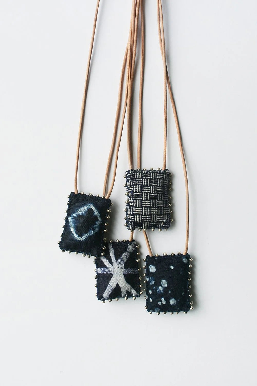 Indigo Talisman Necklaces by See Real Flowers at Abacus Row