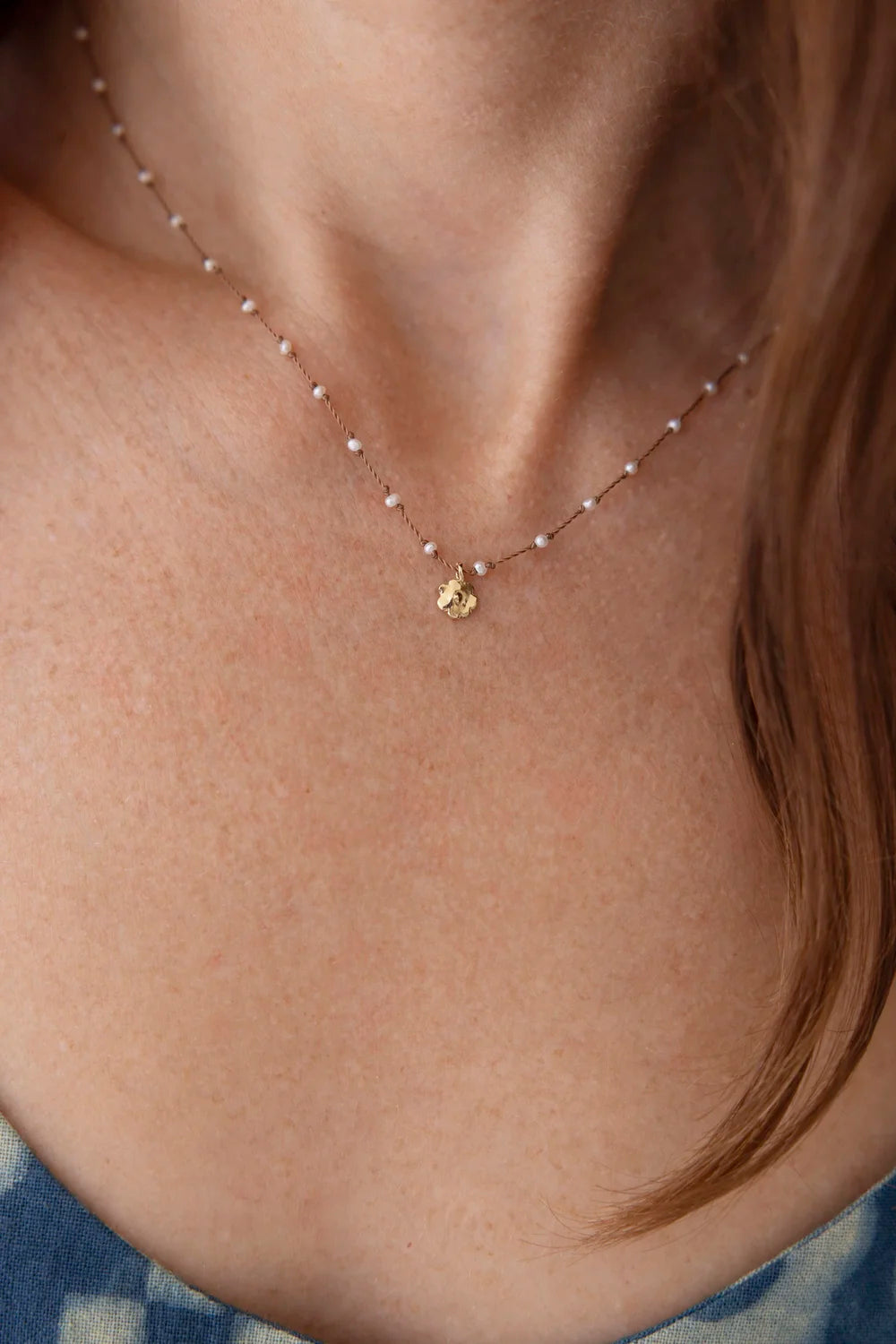 Close Up Modeled Daisy Necklace by See Real Flowers at Abacus Row