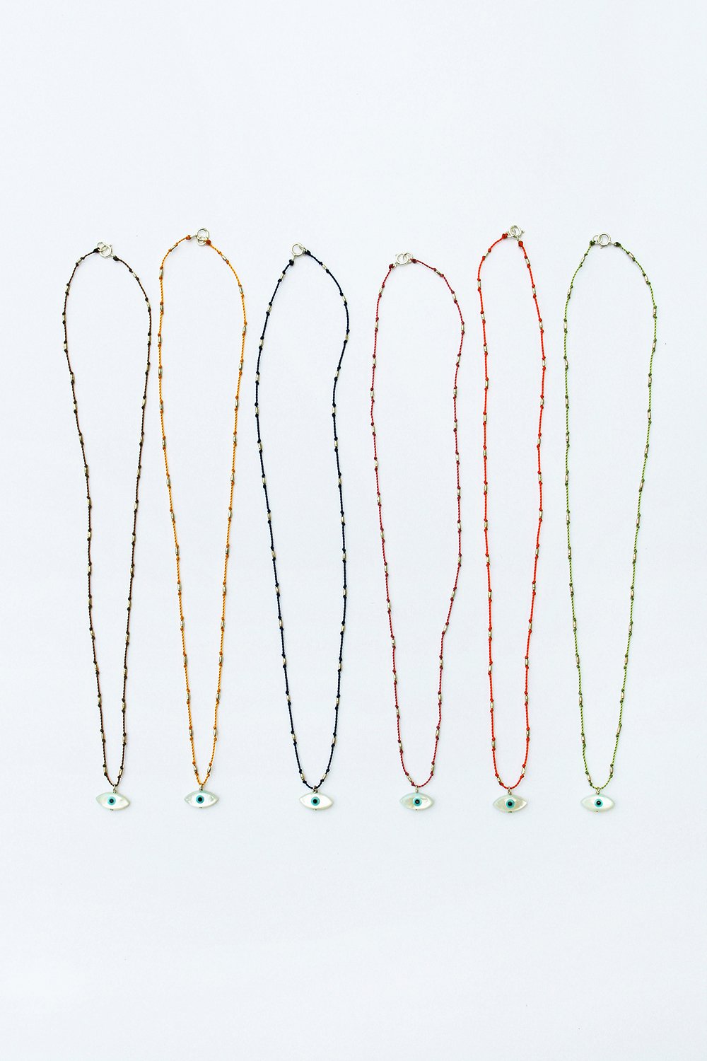 Evil Eye Necklaces by See Real Flowers at Abacus Row Jewelry