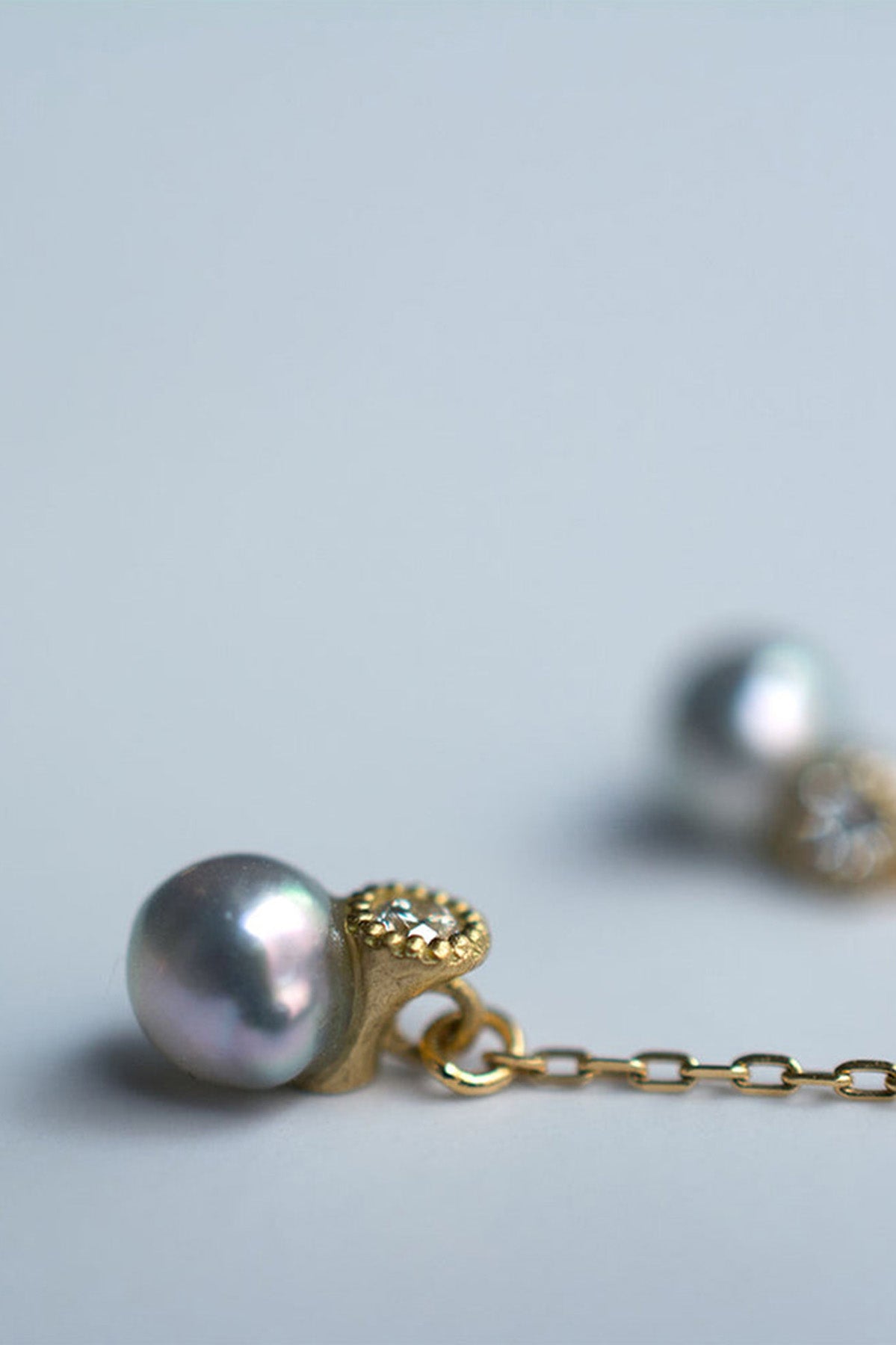 Detail of Baby Akoya Pearl Diamond Chain Earrings by Shinkai at Abacus Row Handmade Jewelry