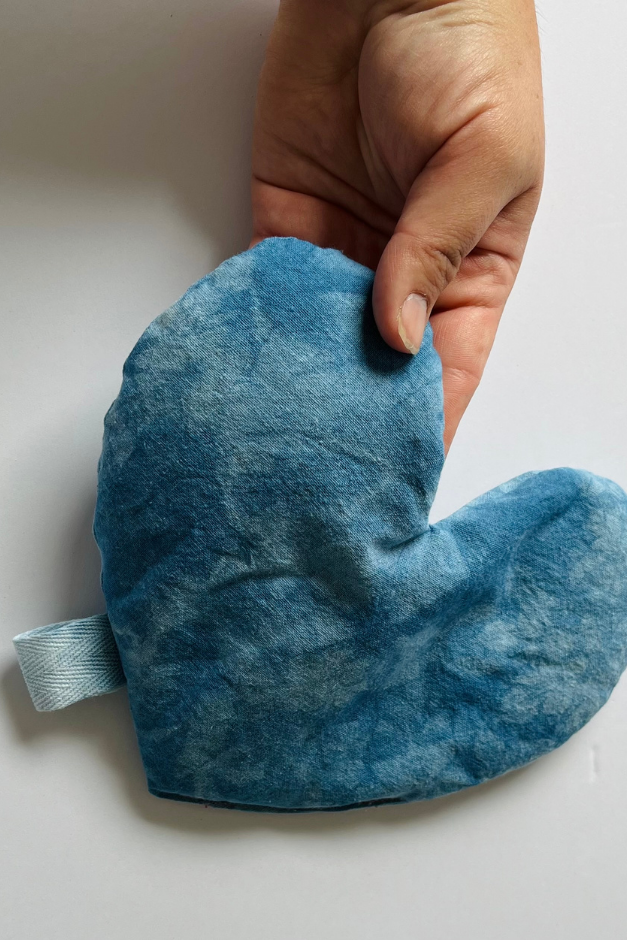 Indigo Sea Heart Eye Pillow in hand by The Materials Design Co at Abacus Row