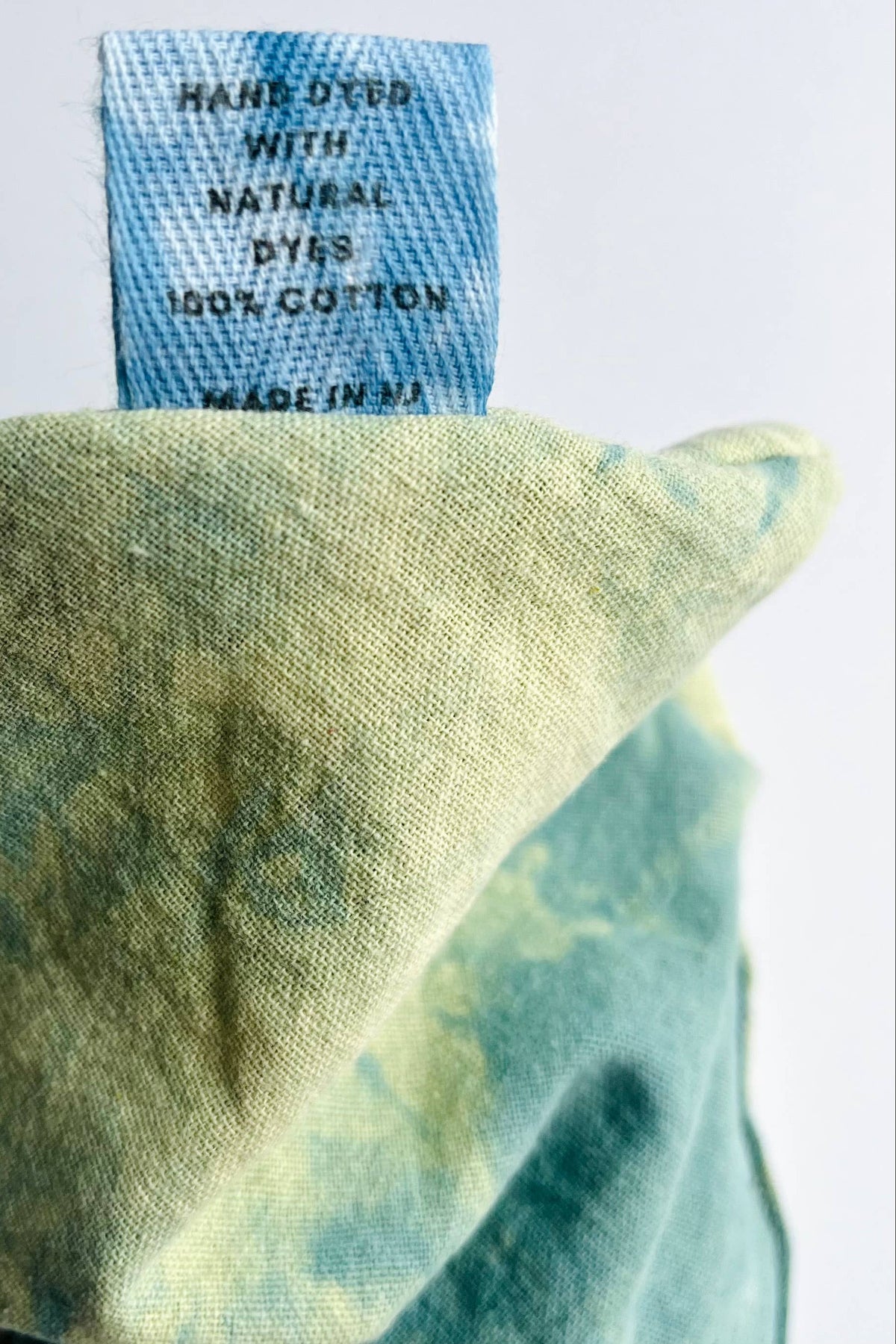 Soft Green Heart Eye Pillow Tag Detail by The Materials Design Co at Abacus Row Handmade Jewelry