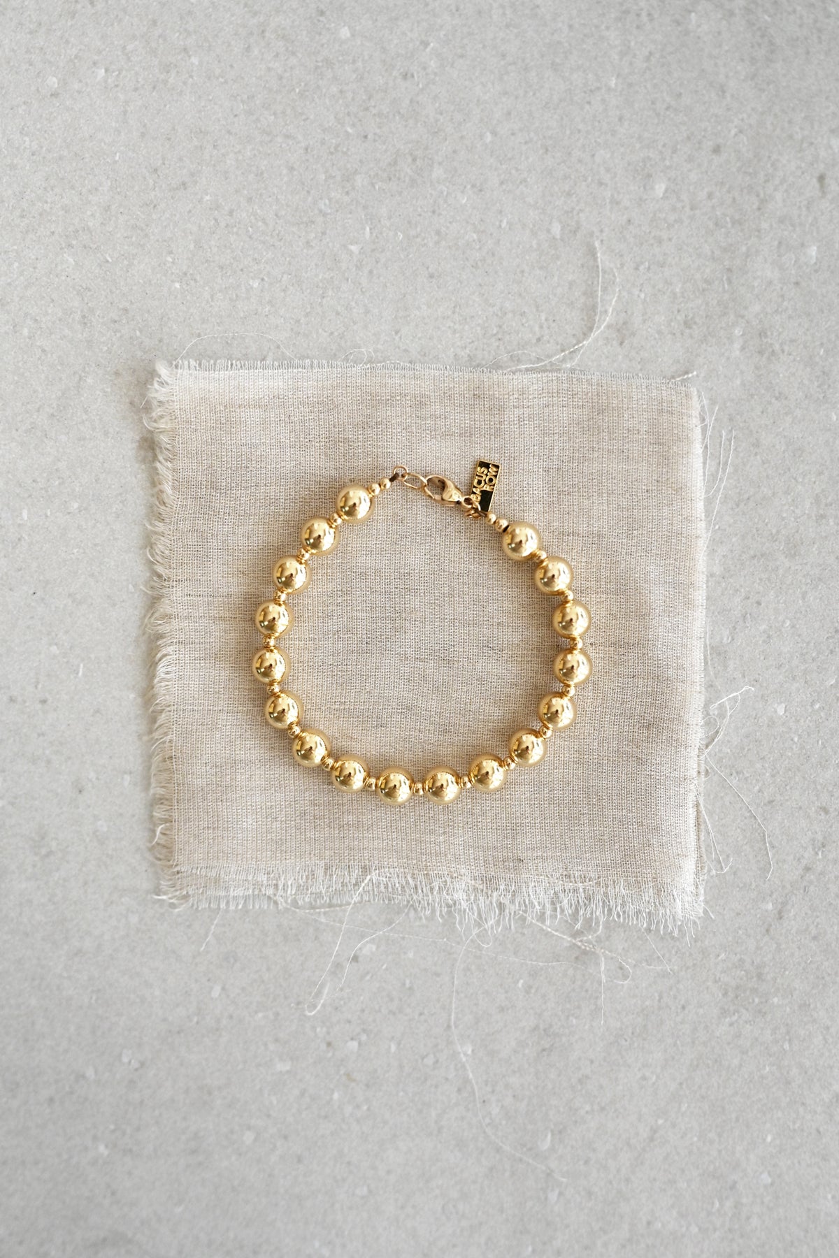 Clasped Moon Sun Bracelet at Abacus Row Handmade Jewelry