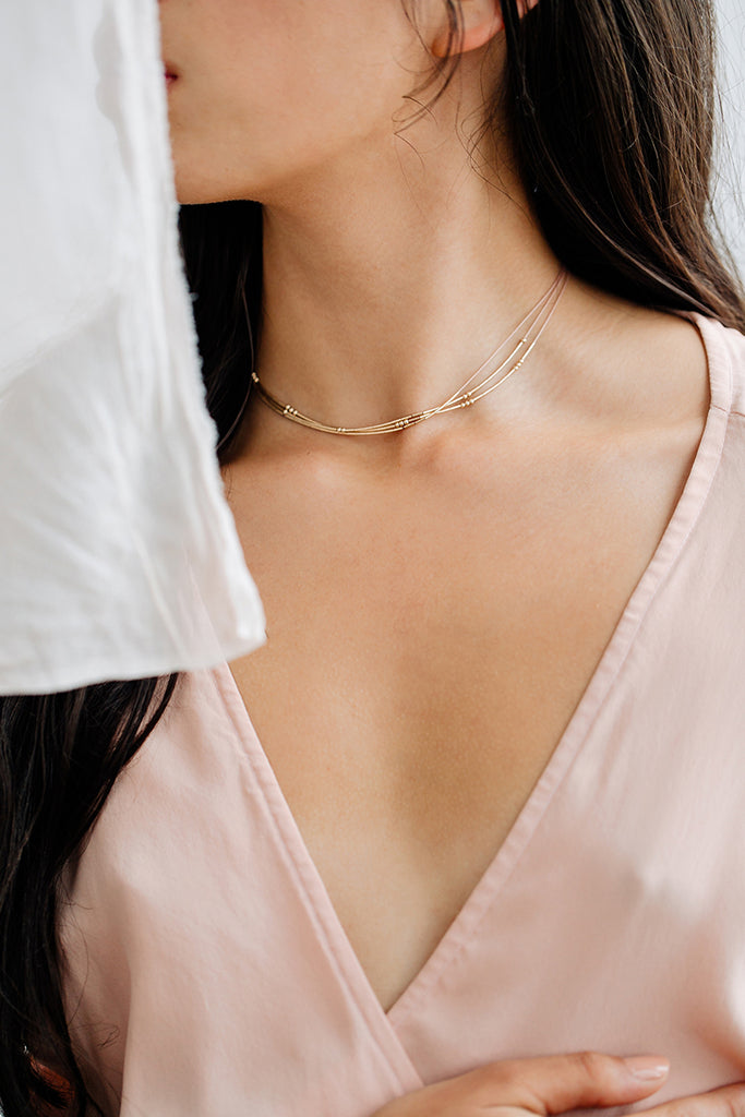 Pictor Necklace, blush model - Abacus Row Handmade Jewelry