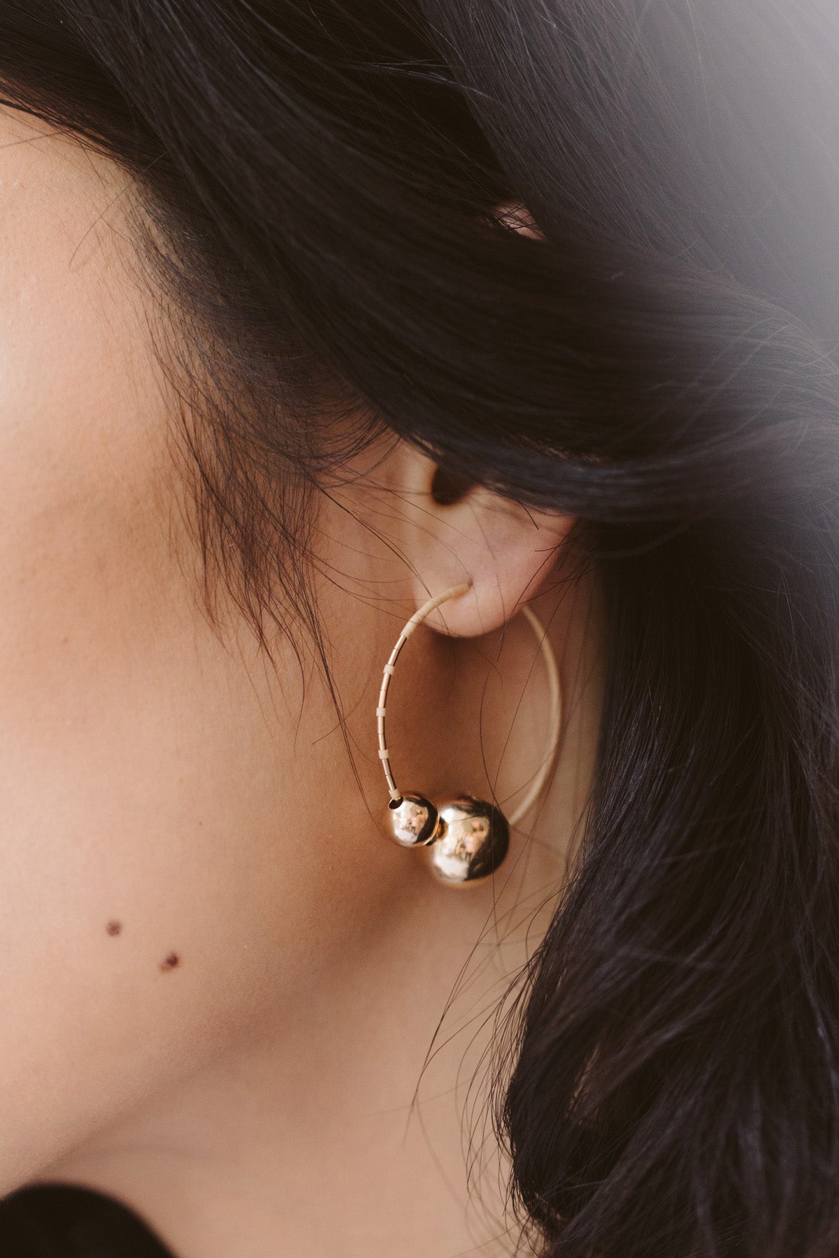 Kari Hoops, Peach on model - Abacus Row Handmade Jewelry