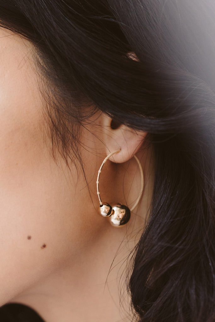 Kari Hoops, Peach on model - Abacus Row Handmade Jewelry