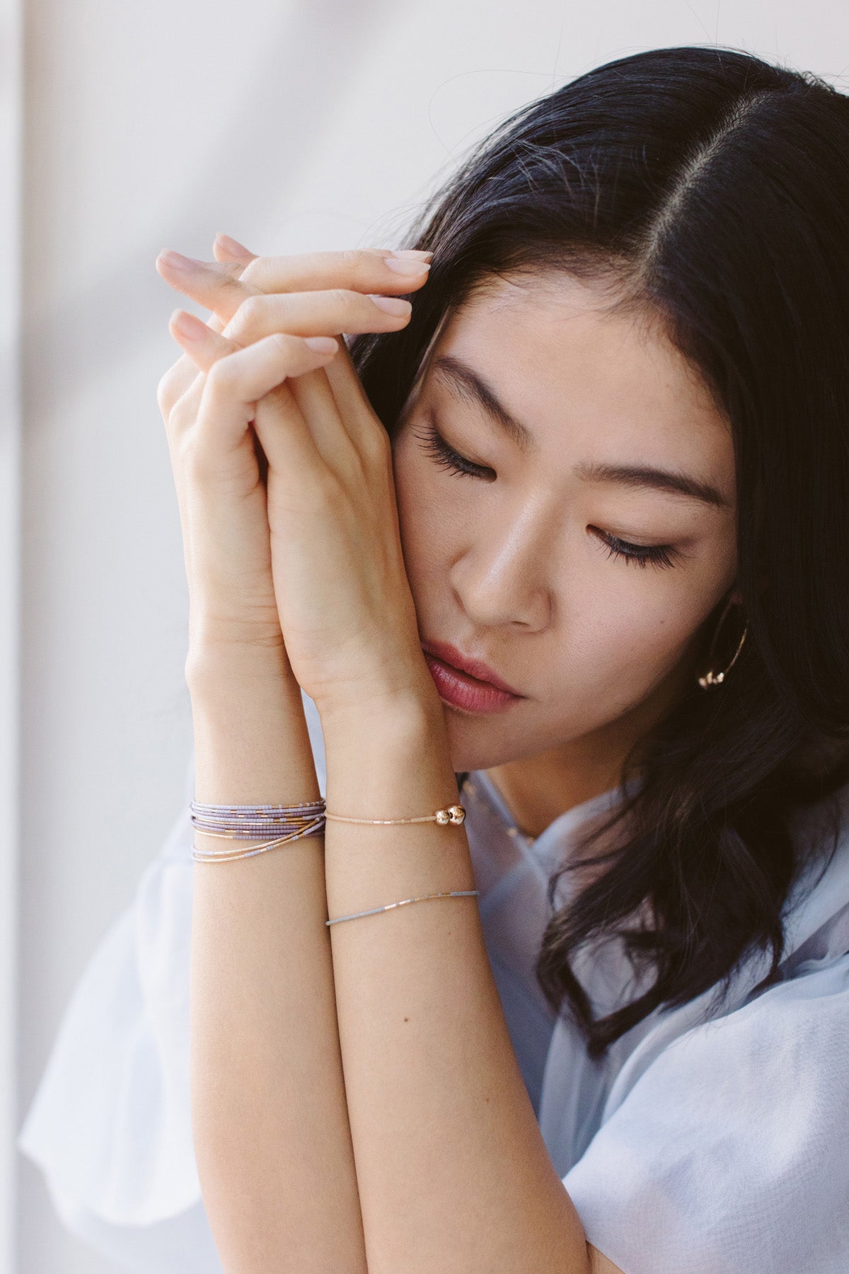 Hati Bracelet, peach modeled - Abacus Row Handmade Jewelry