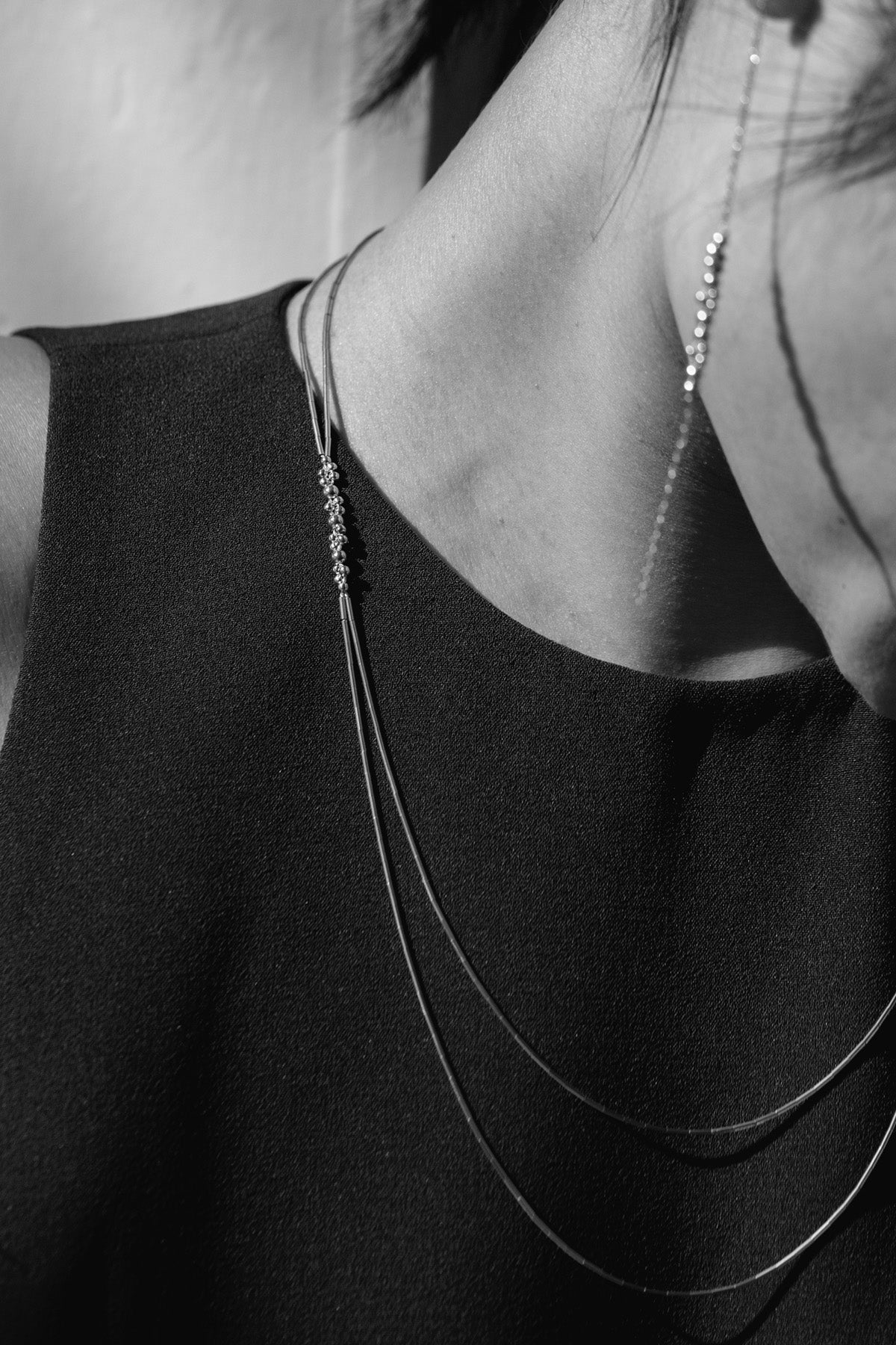 Zosma Necklace model - Abacus Row Handmade Jewelry