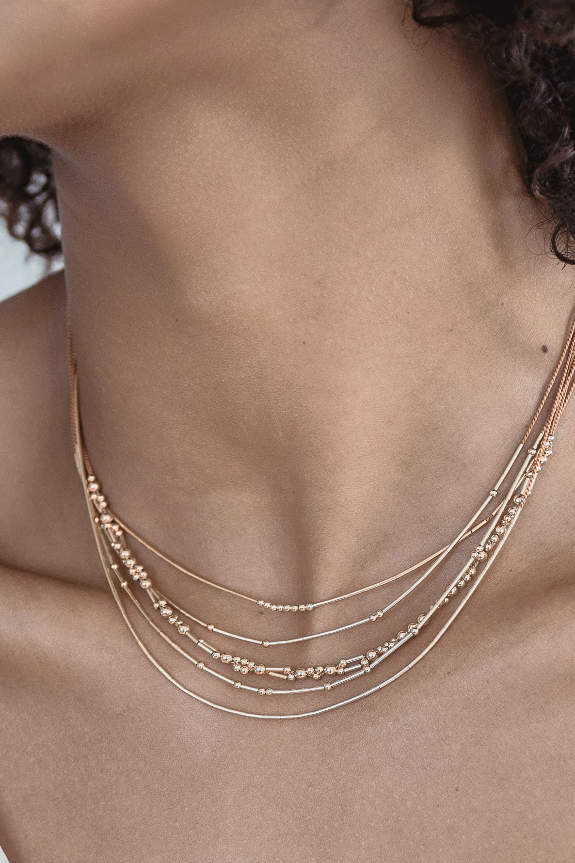 Crux Necklace, fawn modeled - Abacus Row Handmade Jewelry