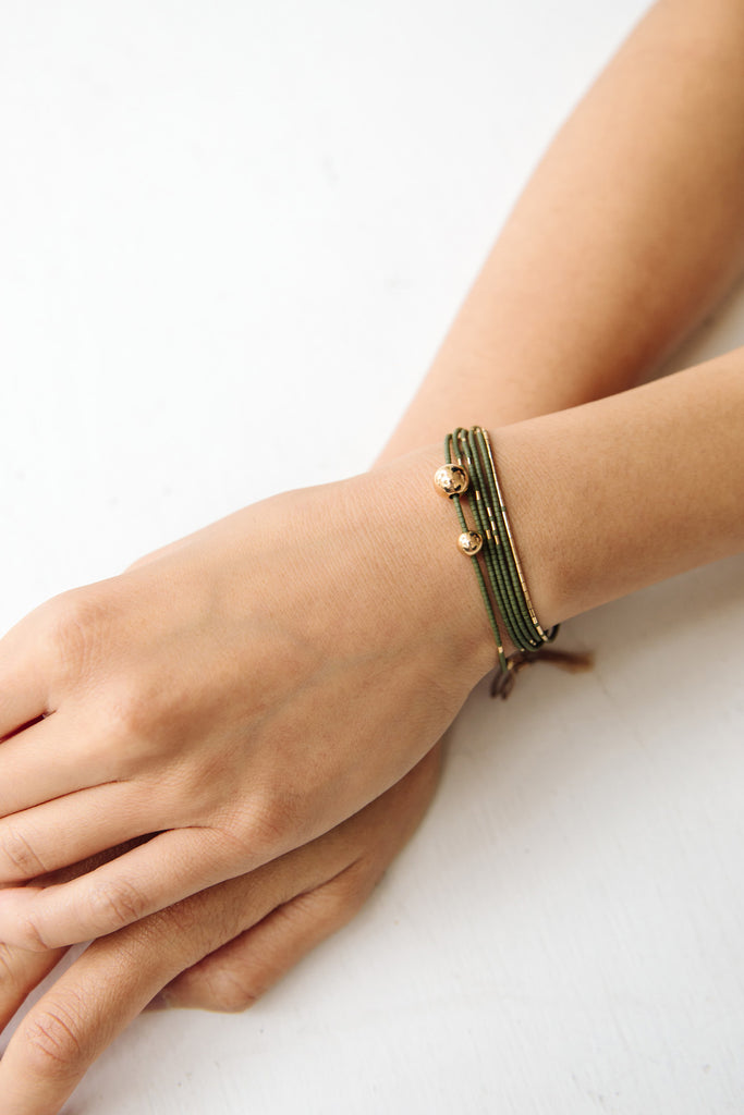 Hati Bracelet and Neso Wrap in Palm by Abacus Row Handmade Jewelry