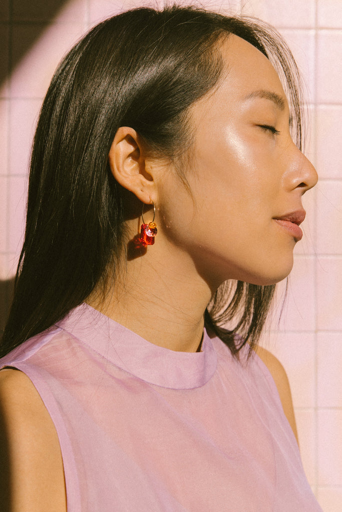 Lai See Earrings on model by Abacus Row Handmade Jewelry
