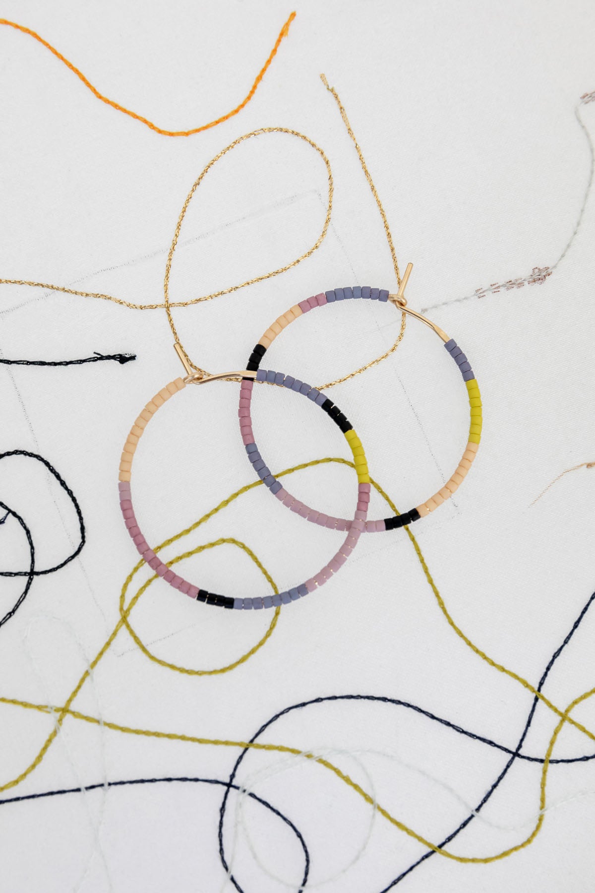 Small Volcano Voyage Hoop Earrings at Abacus Row