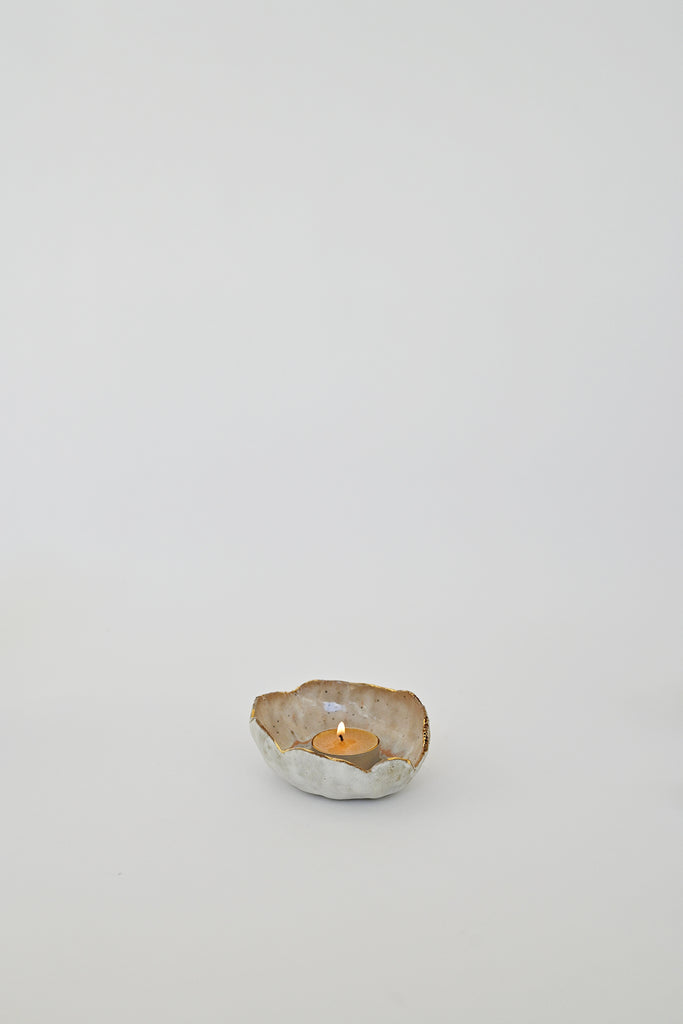 Lit Beeswax Tea Light Candle by Alysia Mazzella in Minh SInger Dish at Abacus Row Jewelry