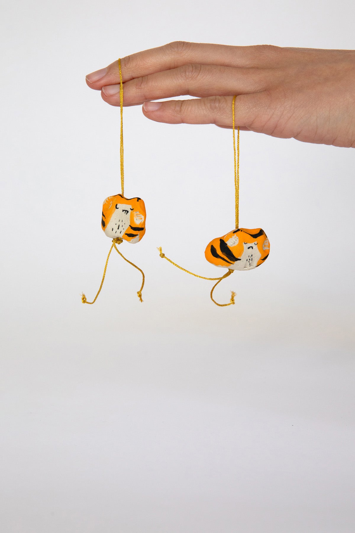 Mini Tiger Hanging Charm by Alyson Iwamoto at Abacus Row Handmade Jewelry