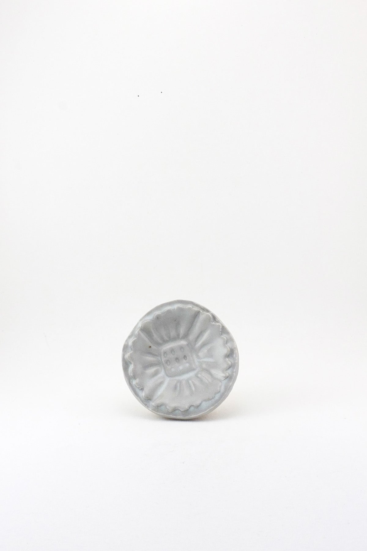 Small Carved Floral Dish by Ariel Clute