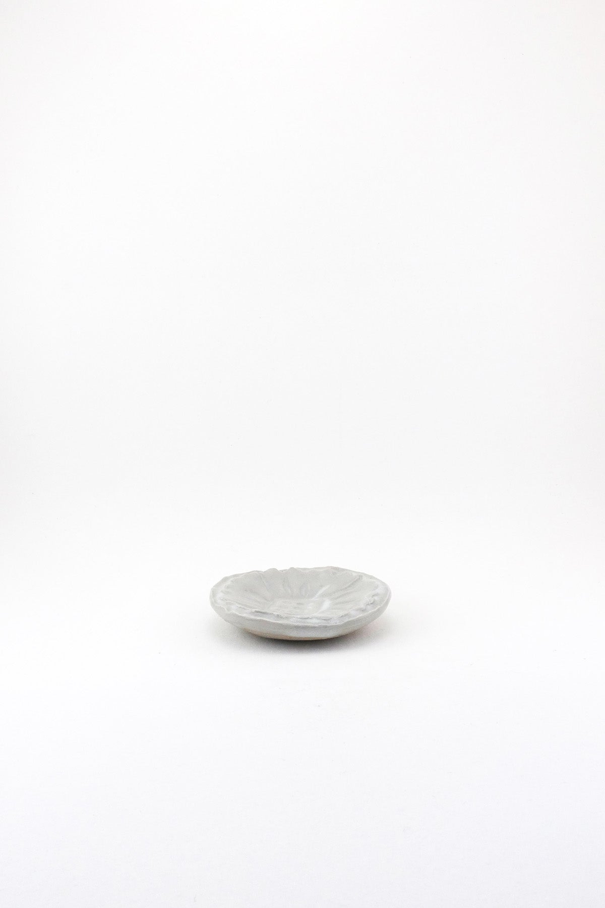 Small Carved Floral Dish by Ariel Clute
