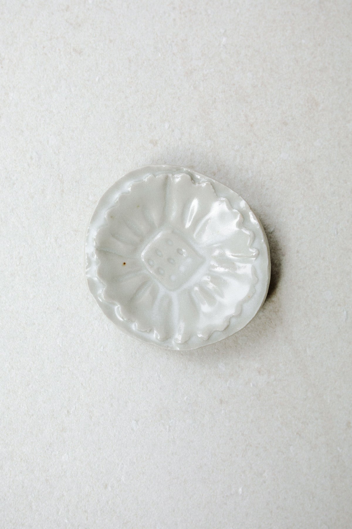 Small Carved Floral Dish by Ariel Clute