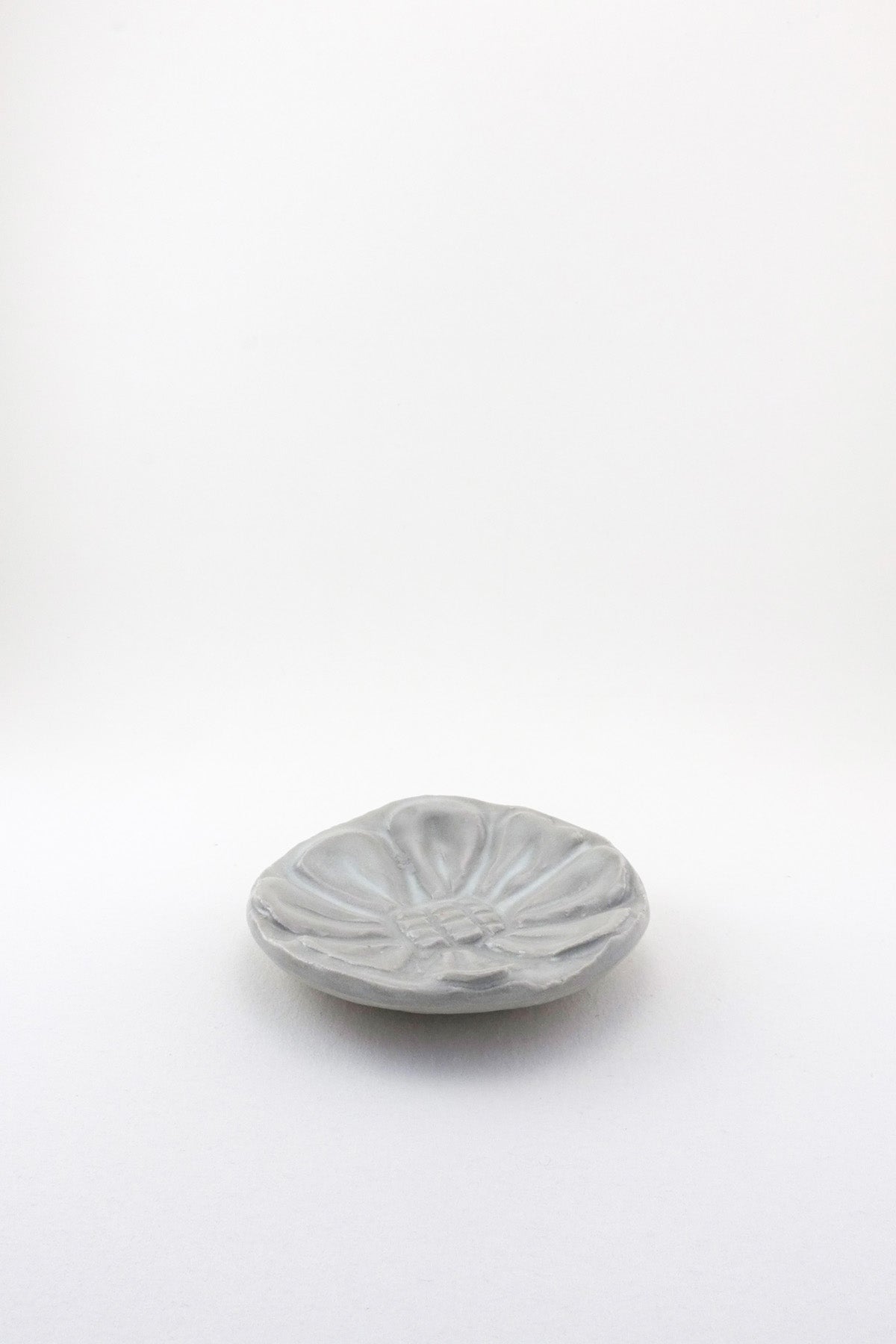 Small Carved Floral Dish by Ariel Clute