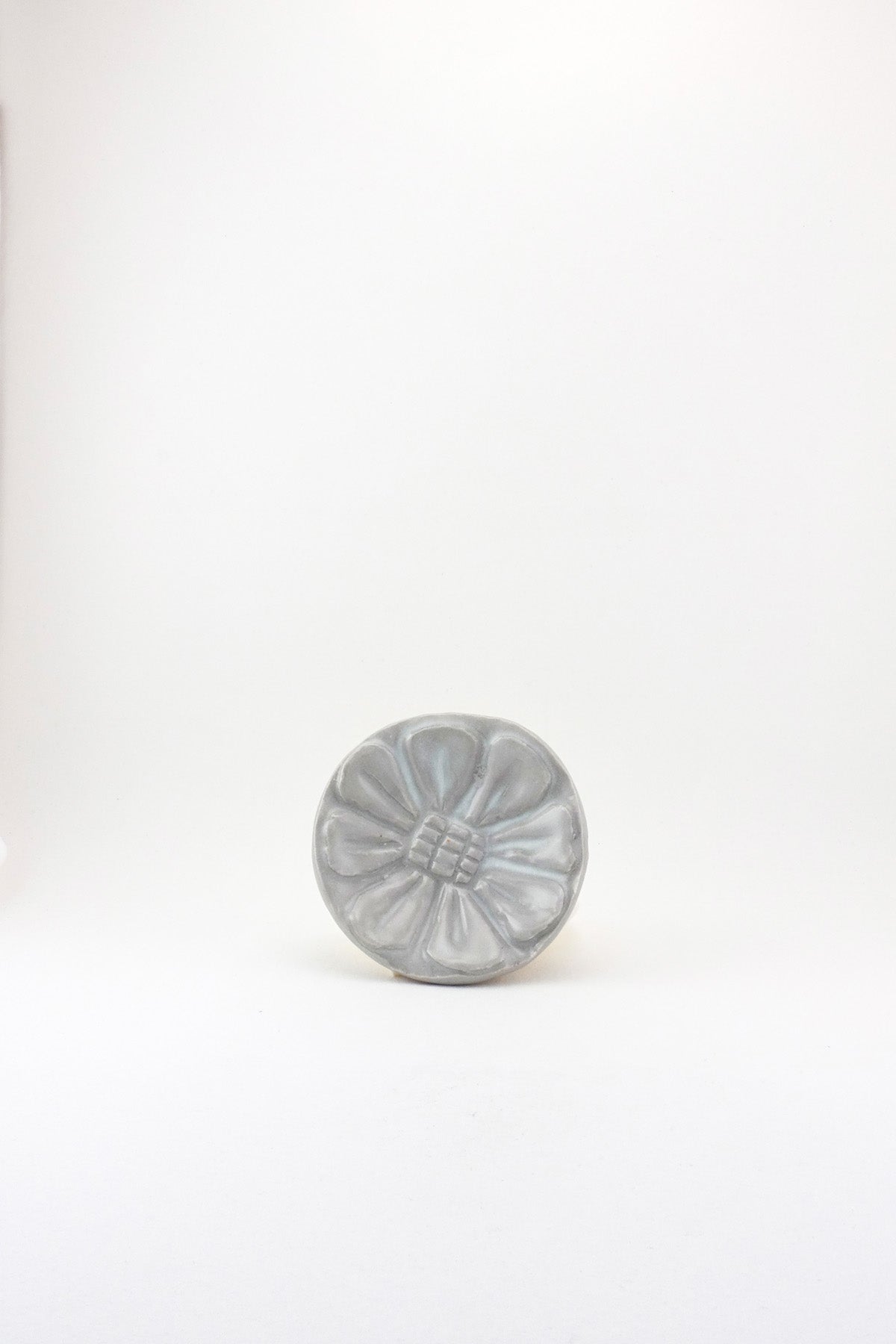 Small Carved Floral Dish by Ariel Clute