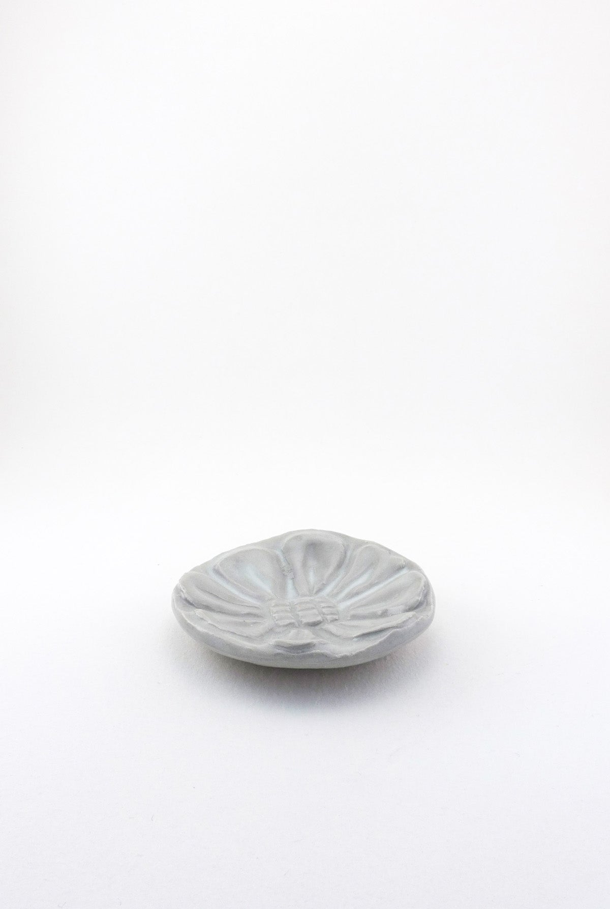 Small Carved Floral Dish by Ariel Clute