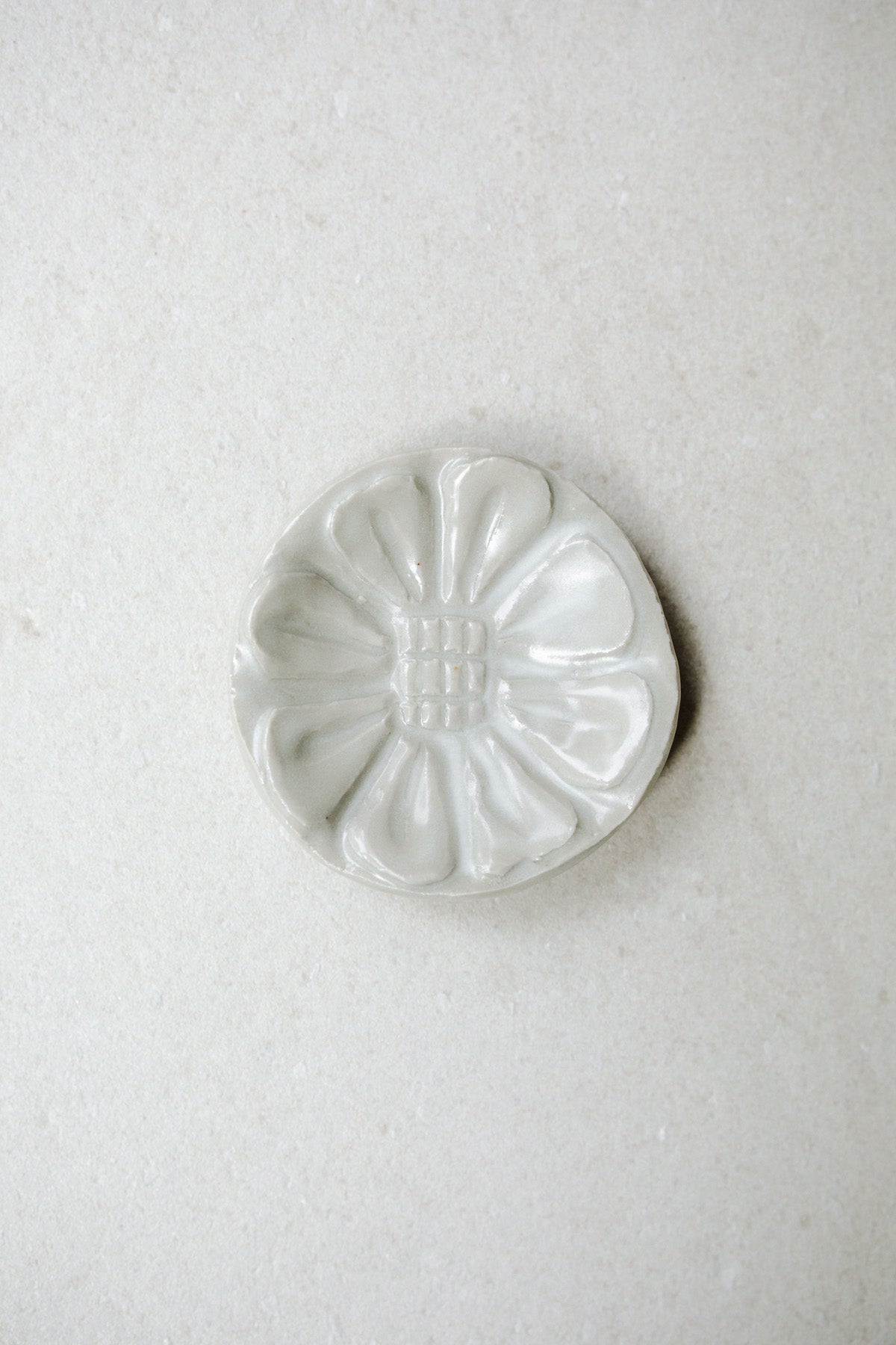 Small Carved Floral Dish by Ariel Clute