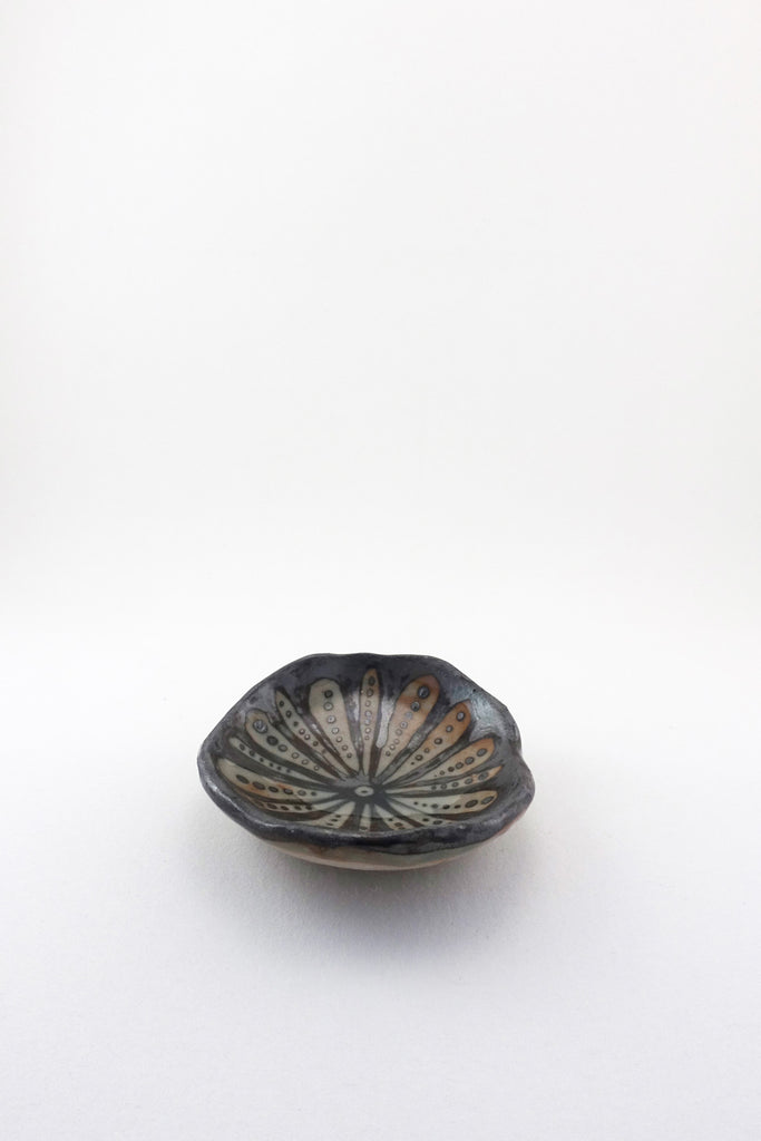 Small Painted Floral Dish in black by Ariel Clute