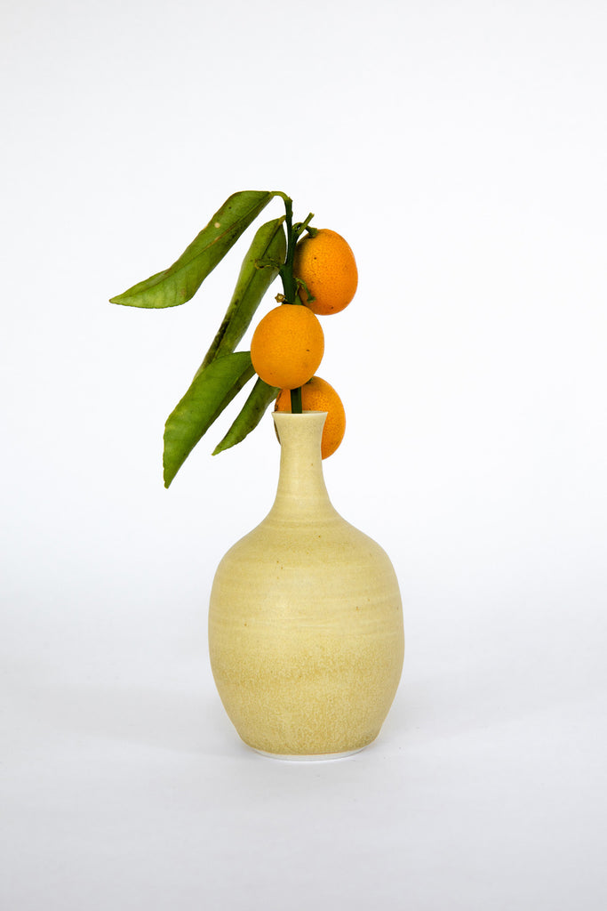 Bud Vase by Vy Voi with Kumquats at Abacus Row